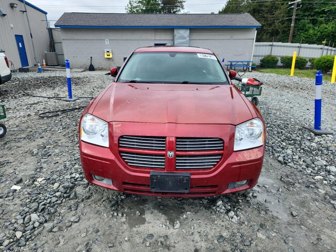 2005 Dodge Magnum R Red vin: 2D4GV58245H624487 Damage: Hood, Peeling, > 12 Inches