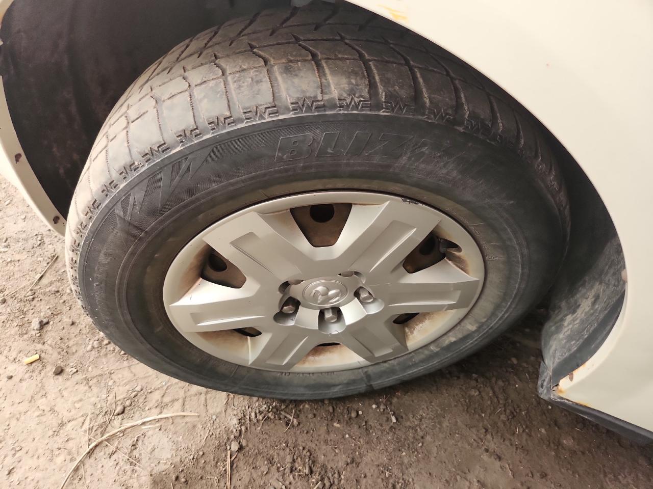 2009 Dodge Grand Caravan C/v White vin: 2D4HN11E79R611119 Damage: Left Front Wheel Cover, Curb Rash, 2 To 3 Inches