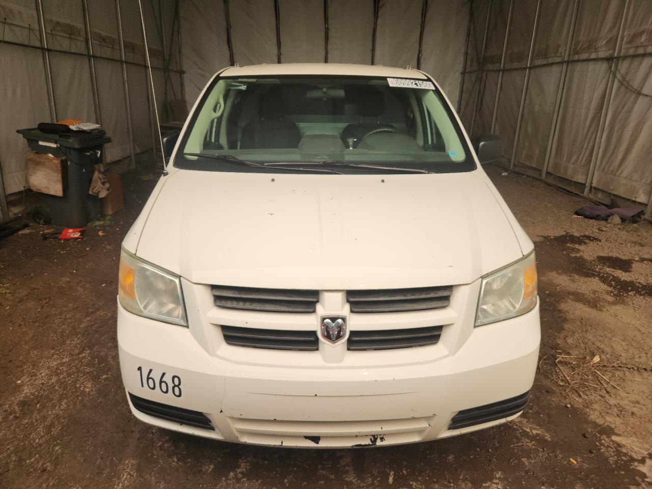 2009 Dodge Grand Caravan C/v White vin: 2D4HN11E79R611119 Damage: Hood, Chipped, 10 Or More