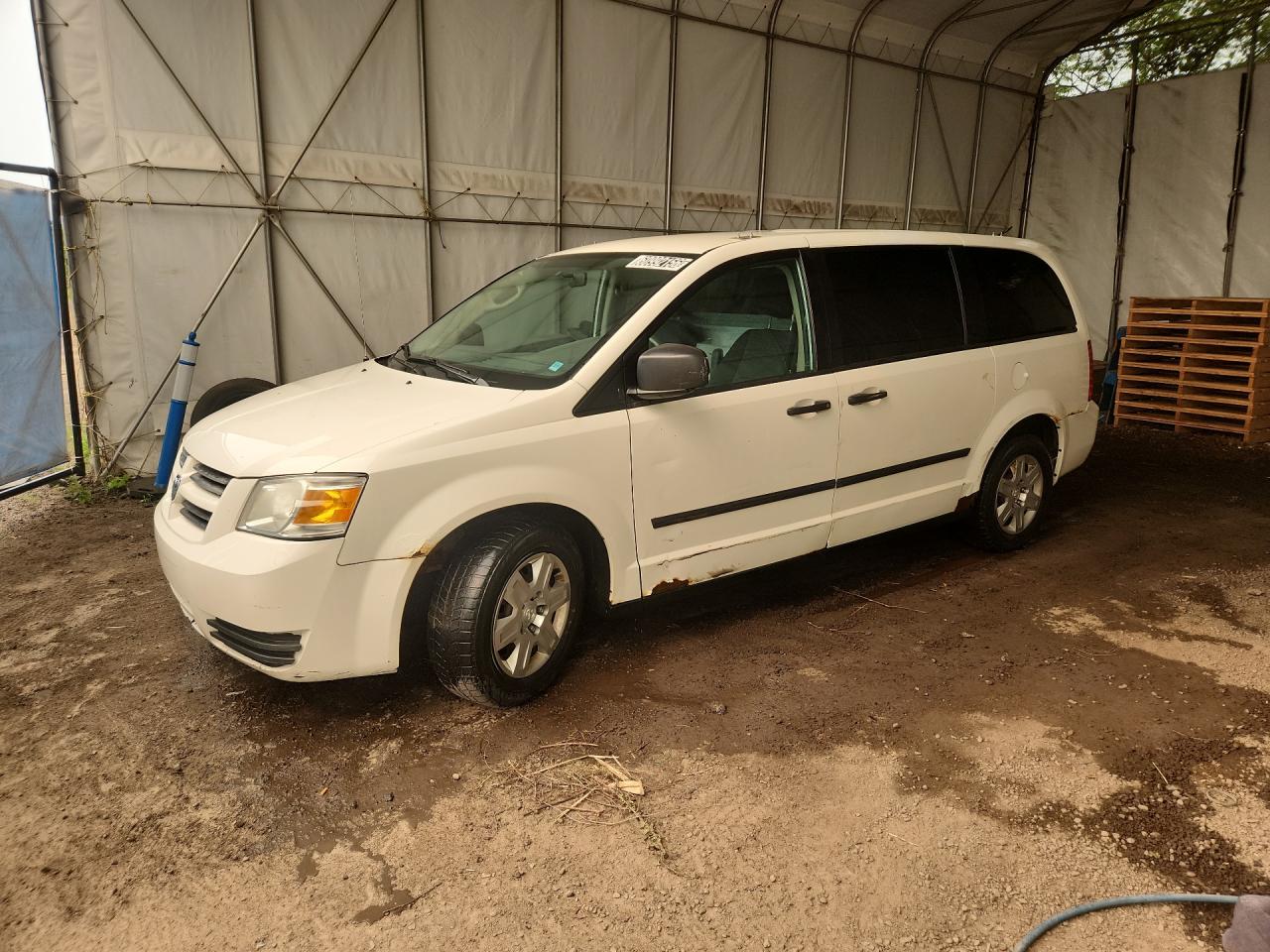 2009 Dodge Grand Caravan C/v White vin: 2D4HN11E79R611119 Damage: Left Front Fender, Rust, > 12 Inches