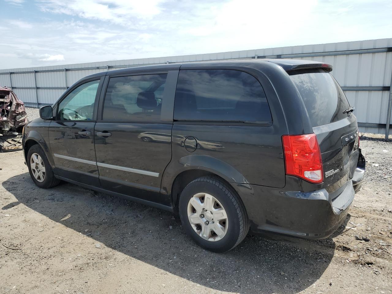 2011 Dodge Grand Caravan C/v Black vin: 2D4RN1AG2BR740087 Damage: Left Qtr Panel, Dent(S) W/No Paint Dmg, > 12 Inches