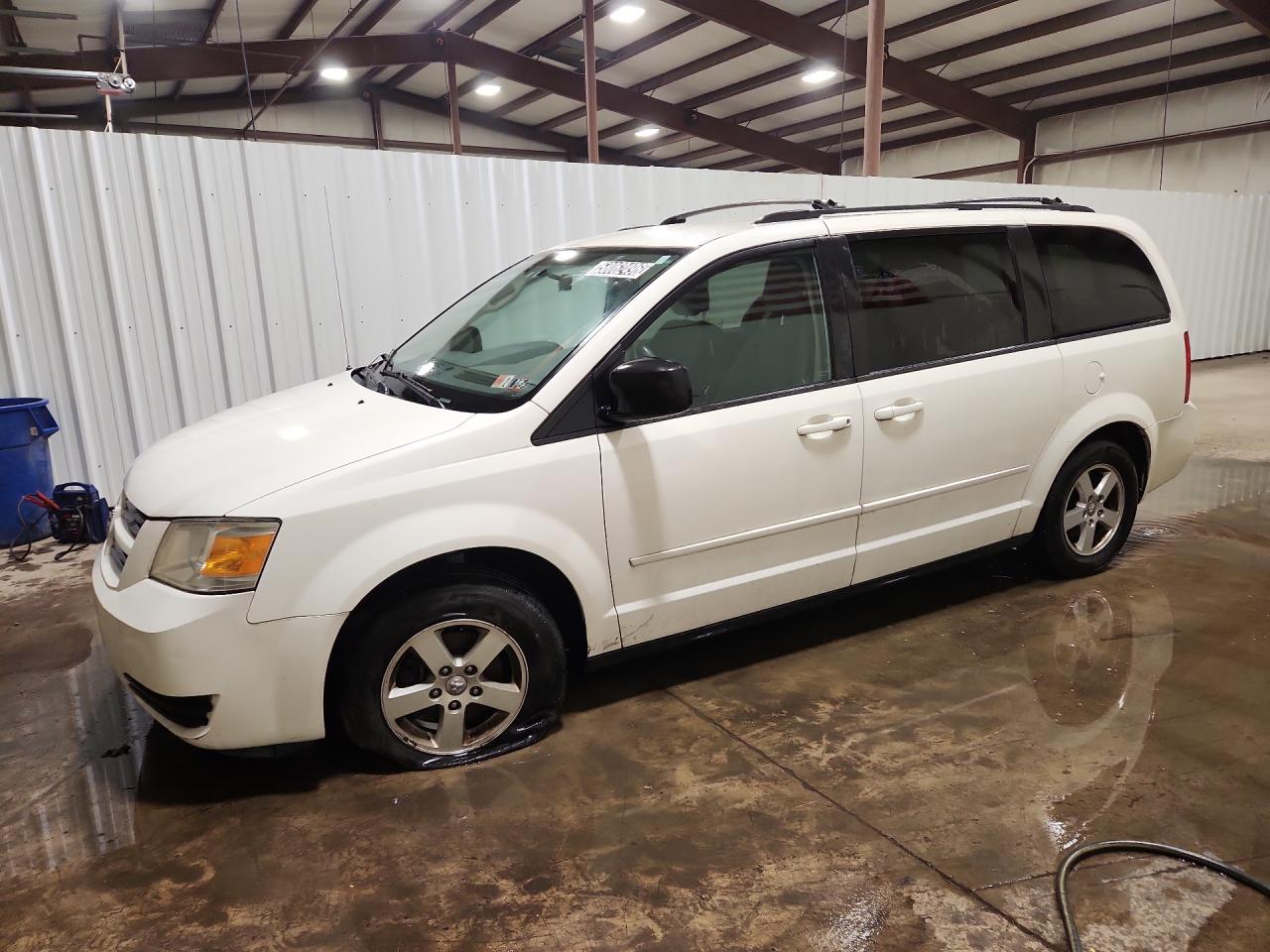2010 Dodge Grand Caravan Hero White vin: 2D4RN3D13AR418821 Damage: Left Front Fender, Chipped, 3