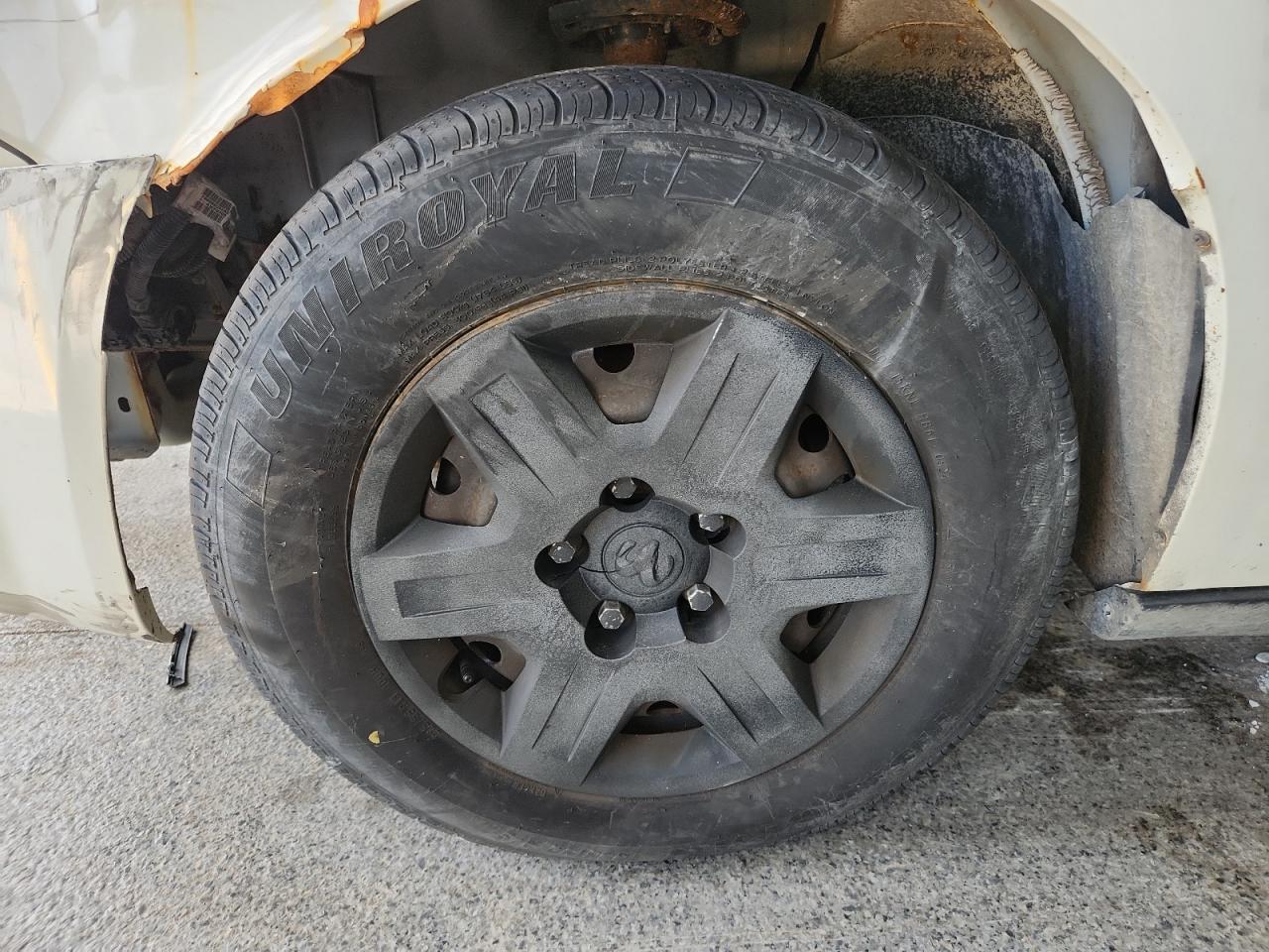 2010 Dodge Grand Caravan Se White vin: 2D4RN4DEXAR134725 Damage: Left Front Wheel Cover, Broken, Replacement Required