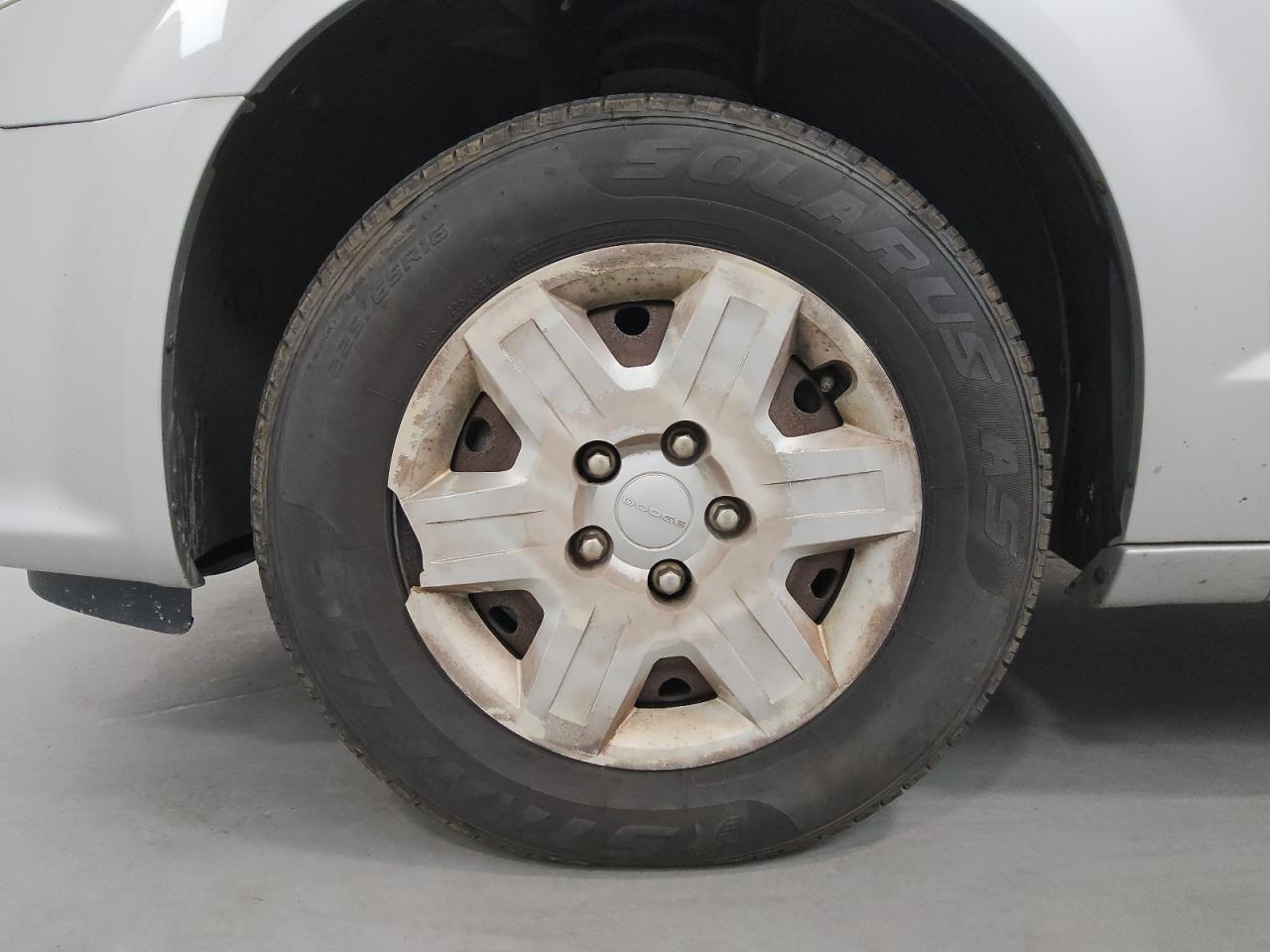 2011 Dodge Grand Caravan Express Silver vin: 2D4RN4DG5BR672459 Damage: Left Front Wheel Cover, Broken, Replacement Required