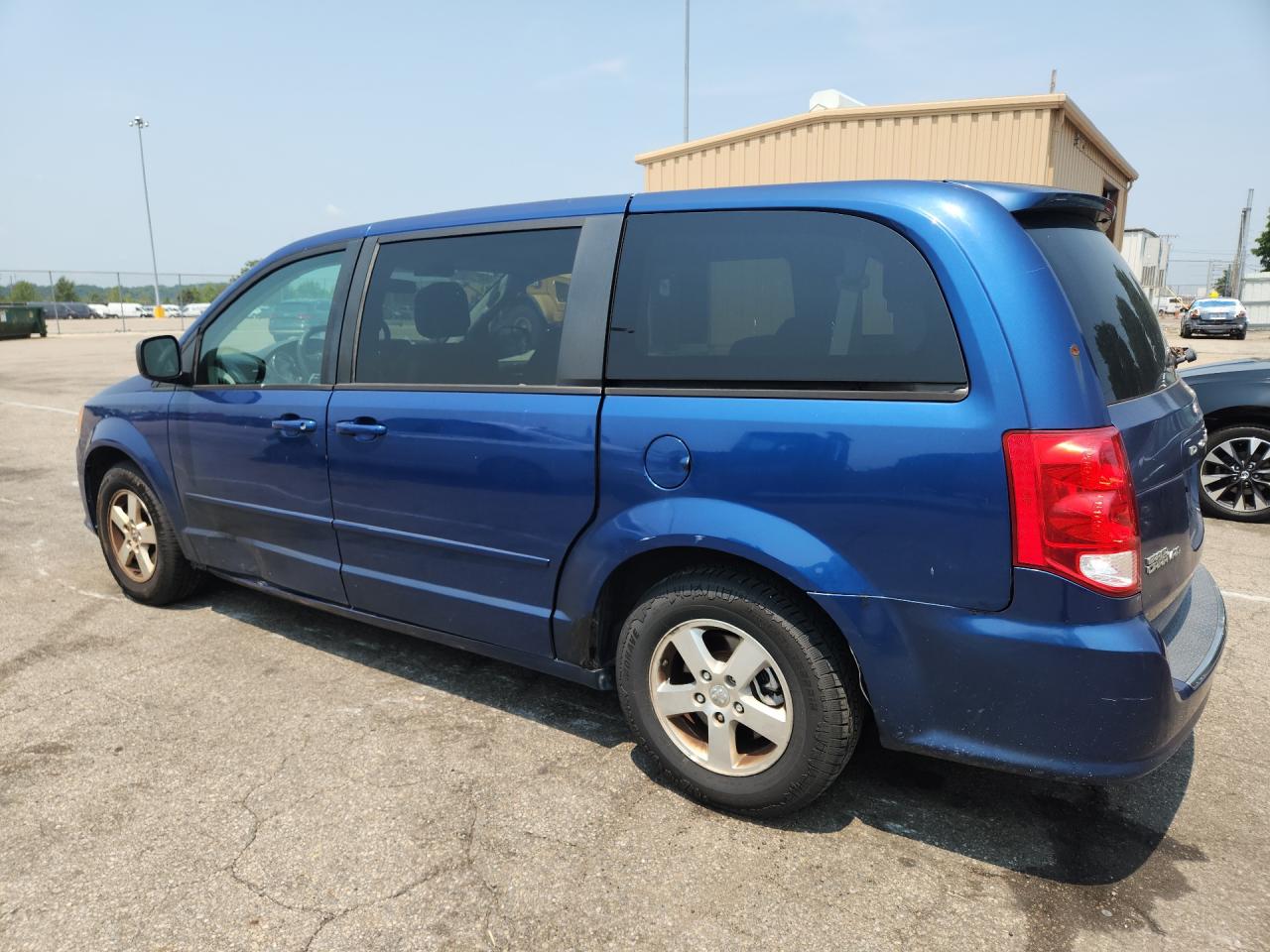 2011 Dodge Grand Caravan Express Blue vin: 2D4RN4DG8BR720553 Damage: Left Qtr Panel, Dent(S) W/ Paint Dmg, 1 To 2 Inches