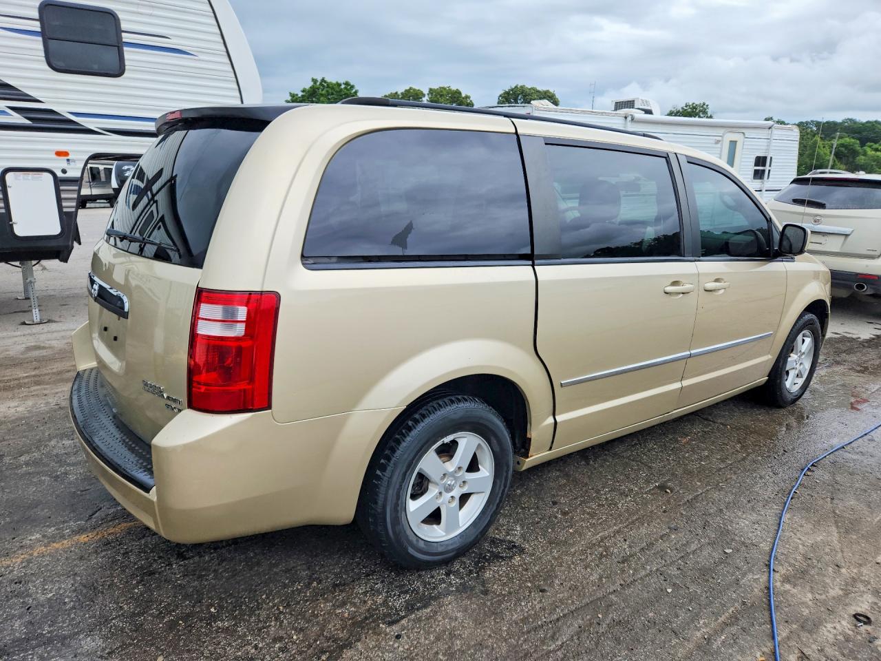 2010 Dodge Grand Caravan Sxt Tan vin: 2D4RN5D15AR483150