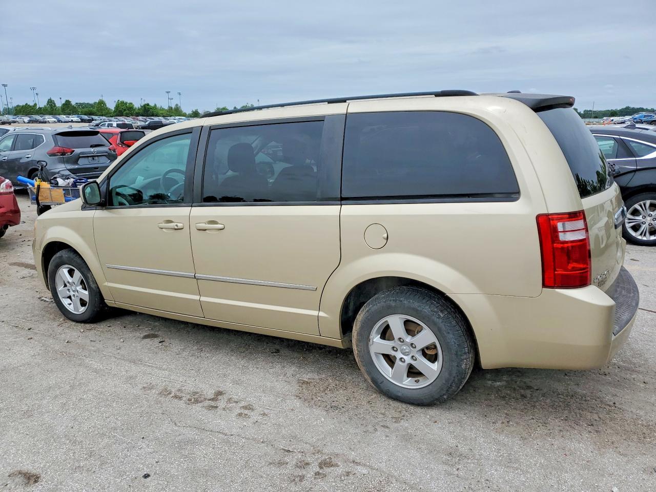 2010 Dodge Grand Caravan Sxt Gold vin: 2D4RN5D16AR459035