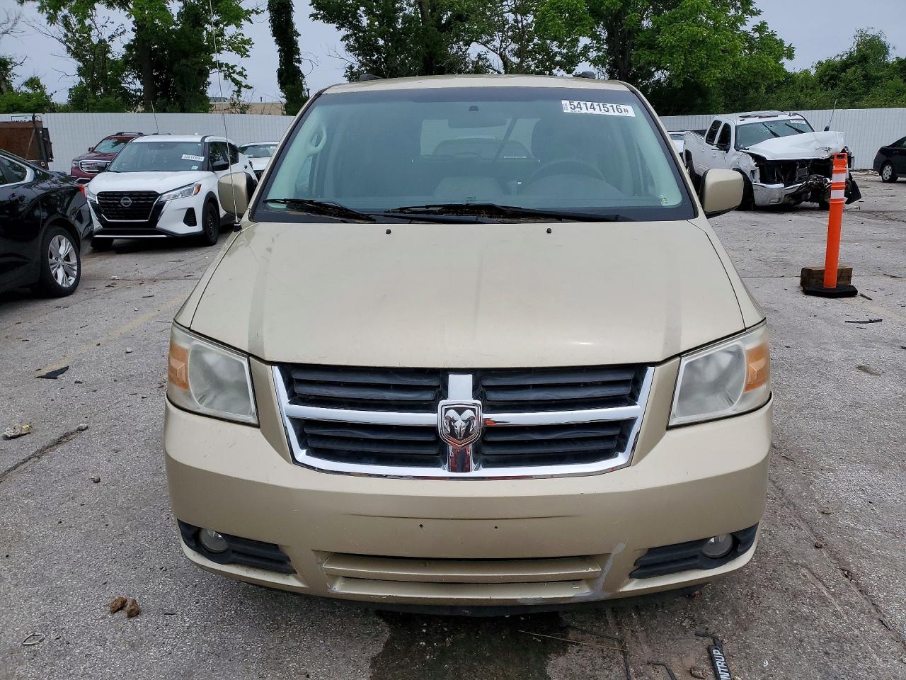 2010 Dodge Grand Caravan Sxt Gold vin: 2D4RN5D16AR459035