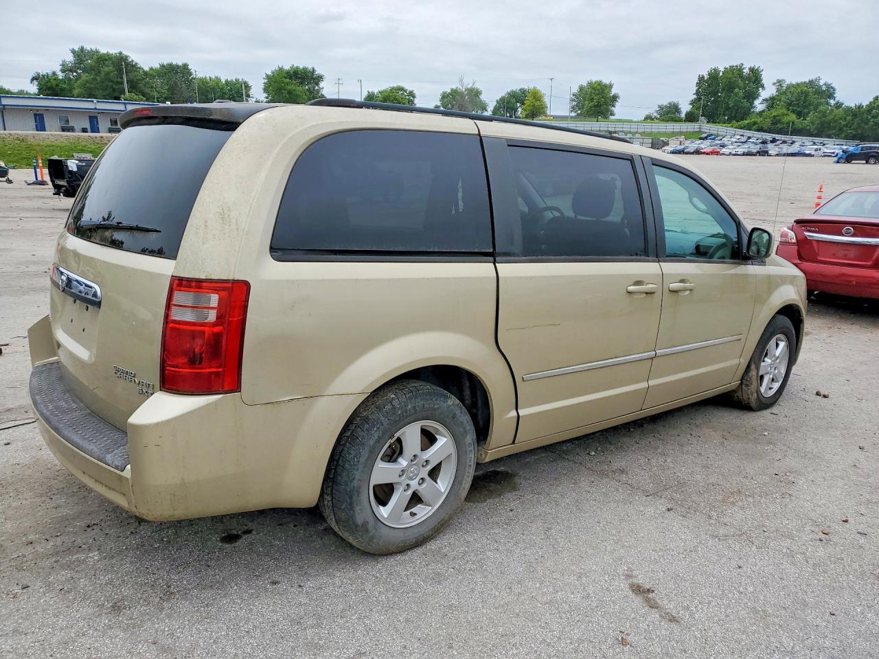 2010 Dodge Grand Caravan Sxt Gold vin: 2D4RN5D16AR459035