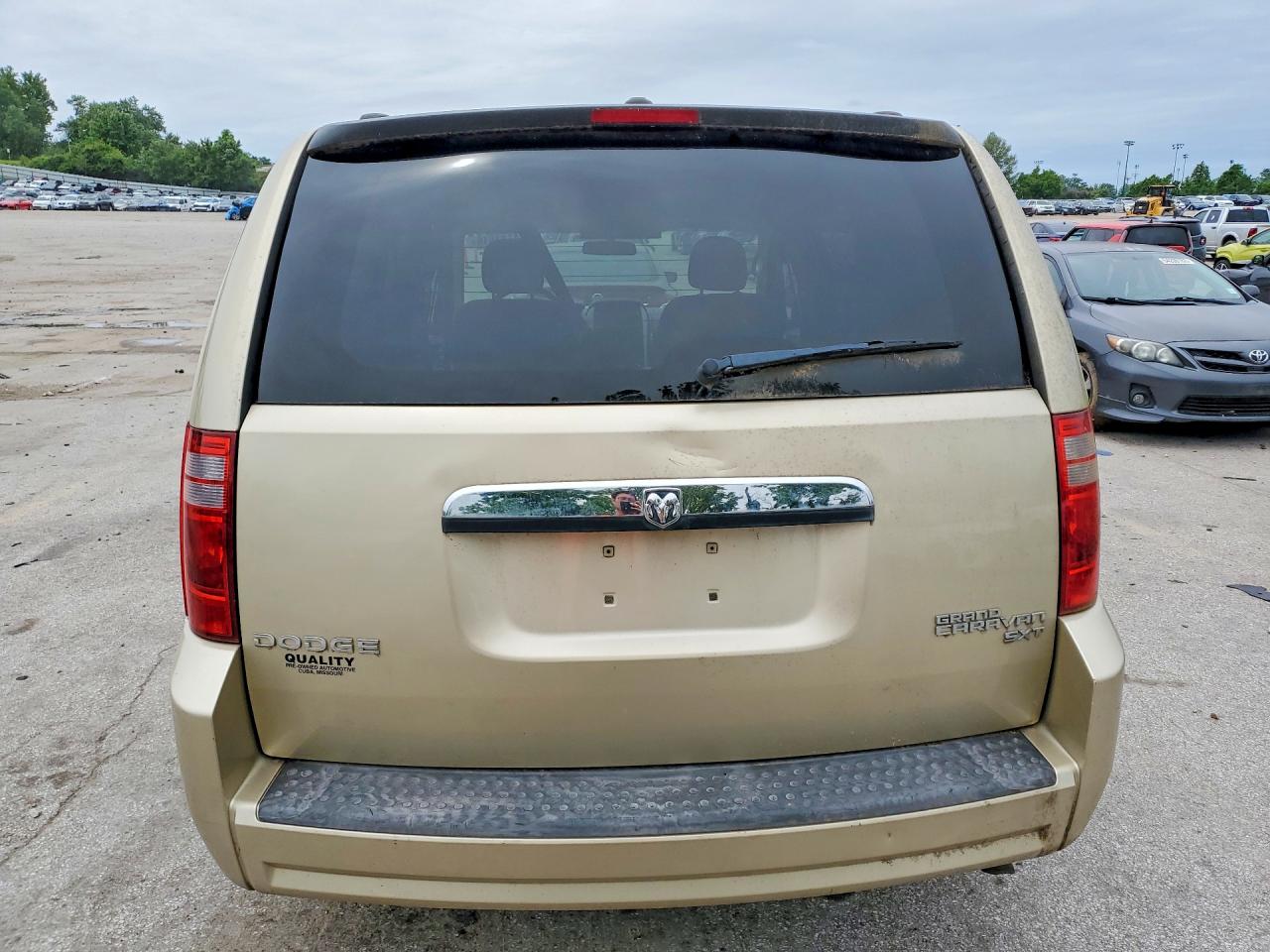 2010 Dodge Grand Caravan Sxt Gold vin: 2D4RN5D16AR459035