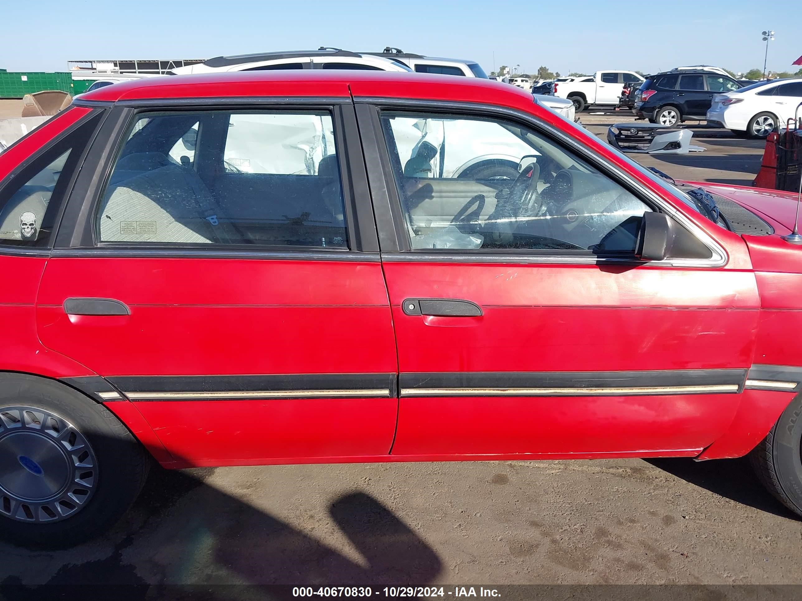 1991 Ford Tempo L Red vin: 2FABP35X8MB192984