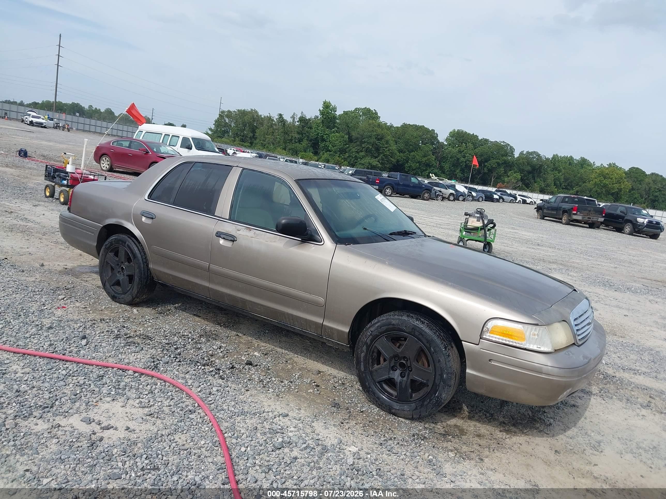 2003 Ford Crown Victoria Police Золотой vin: 2FAFP71W73X205327