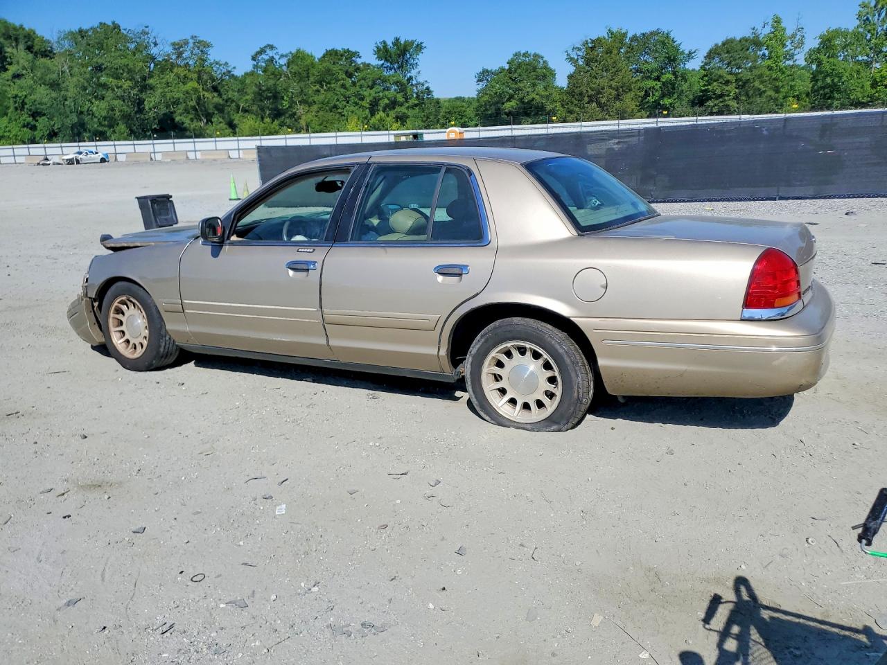 1999 Ford Crown Vic Cou Gold vin: 2FAFP74W0XX115762