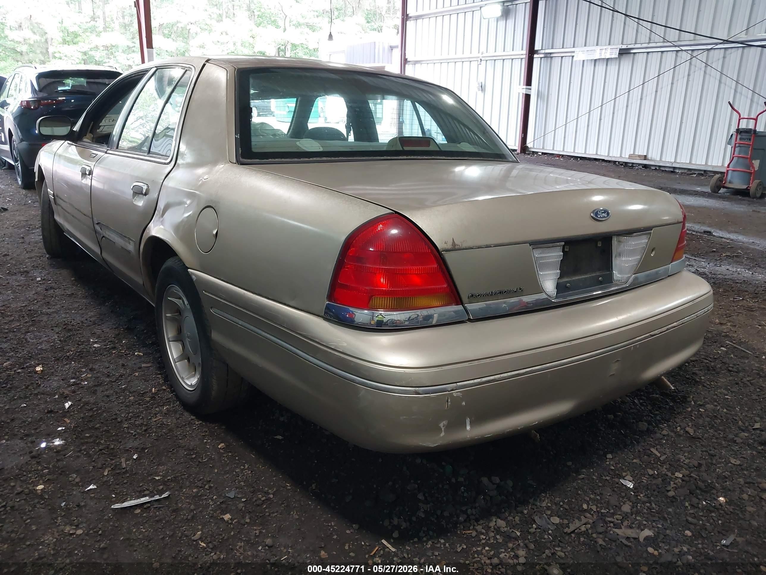 2000 Ford Crown Victoria Lx Beige vin: 2FAFP74W1YX144530