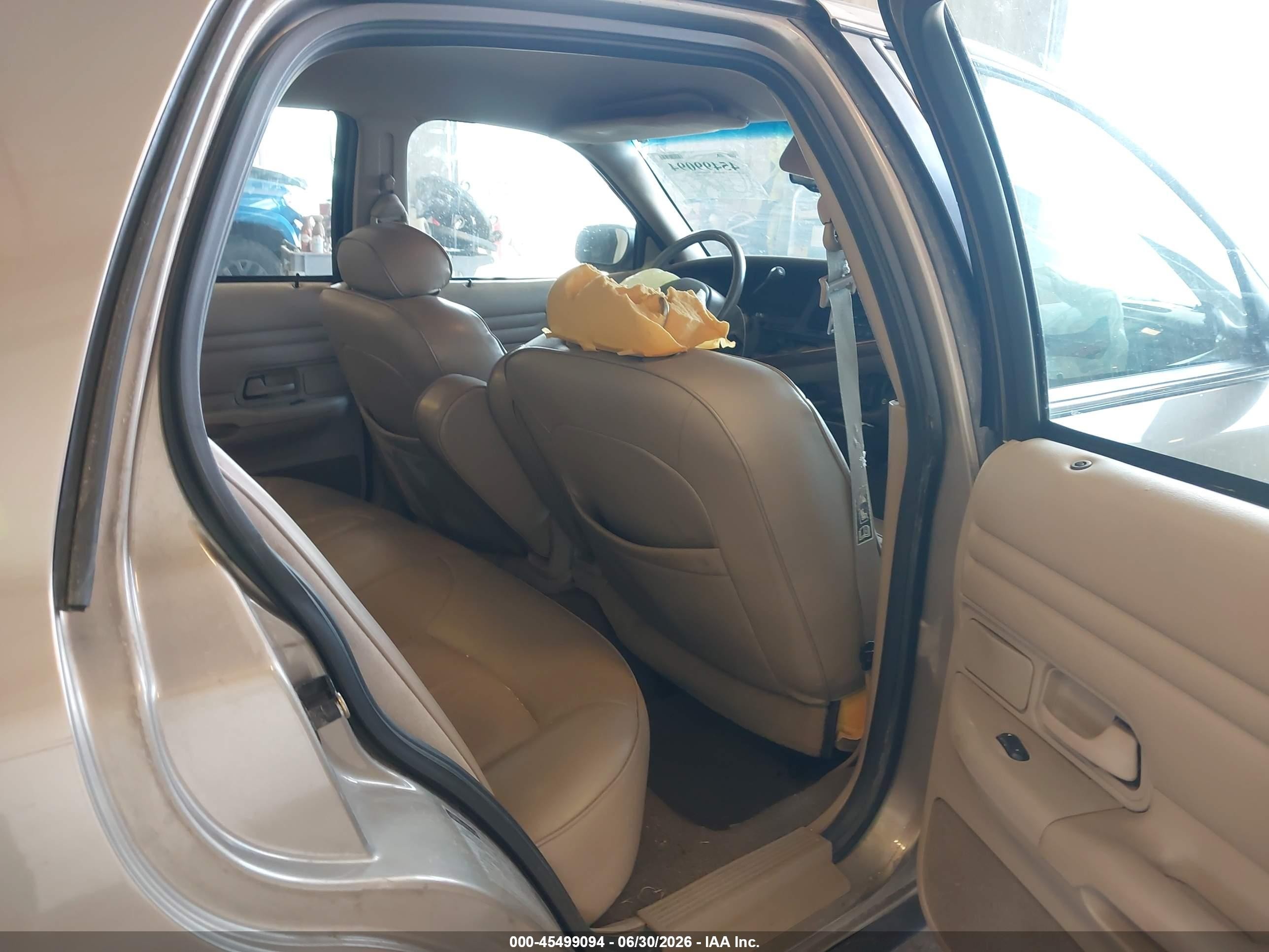 2002 Ford Crown Victoria Lx Желто-коричневый vin: 2FAFP74W72X110633