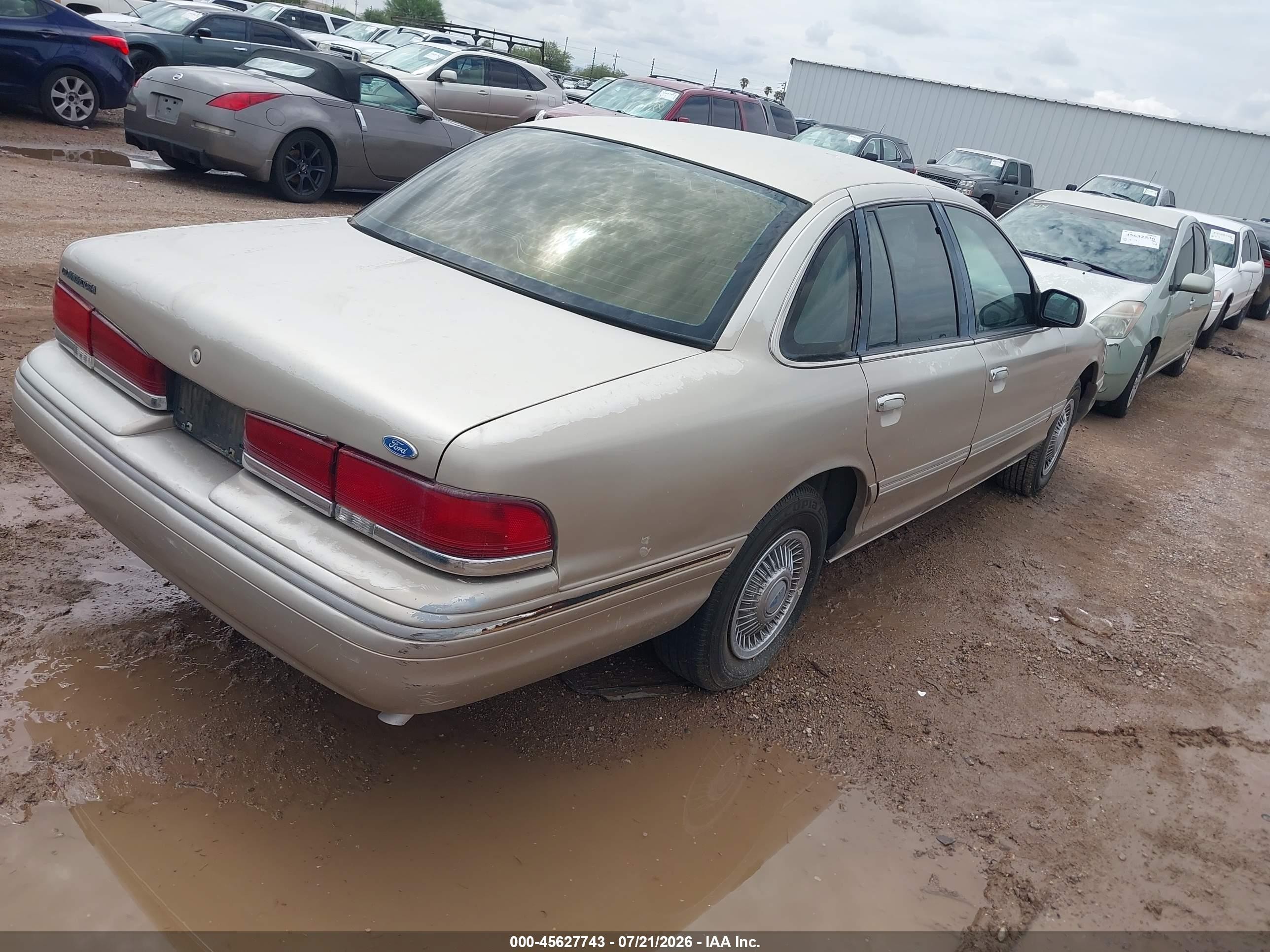 1997 Ford Crown Victoria   Champagne vin: 2FALP73W3VX109665