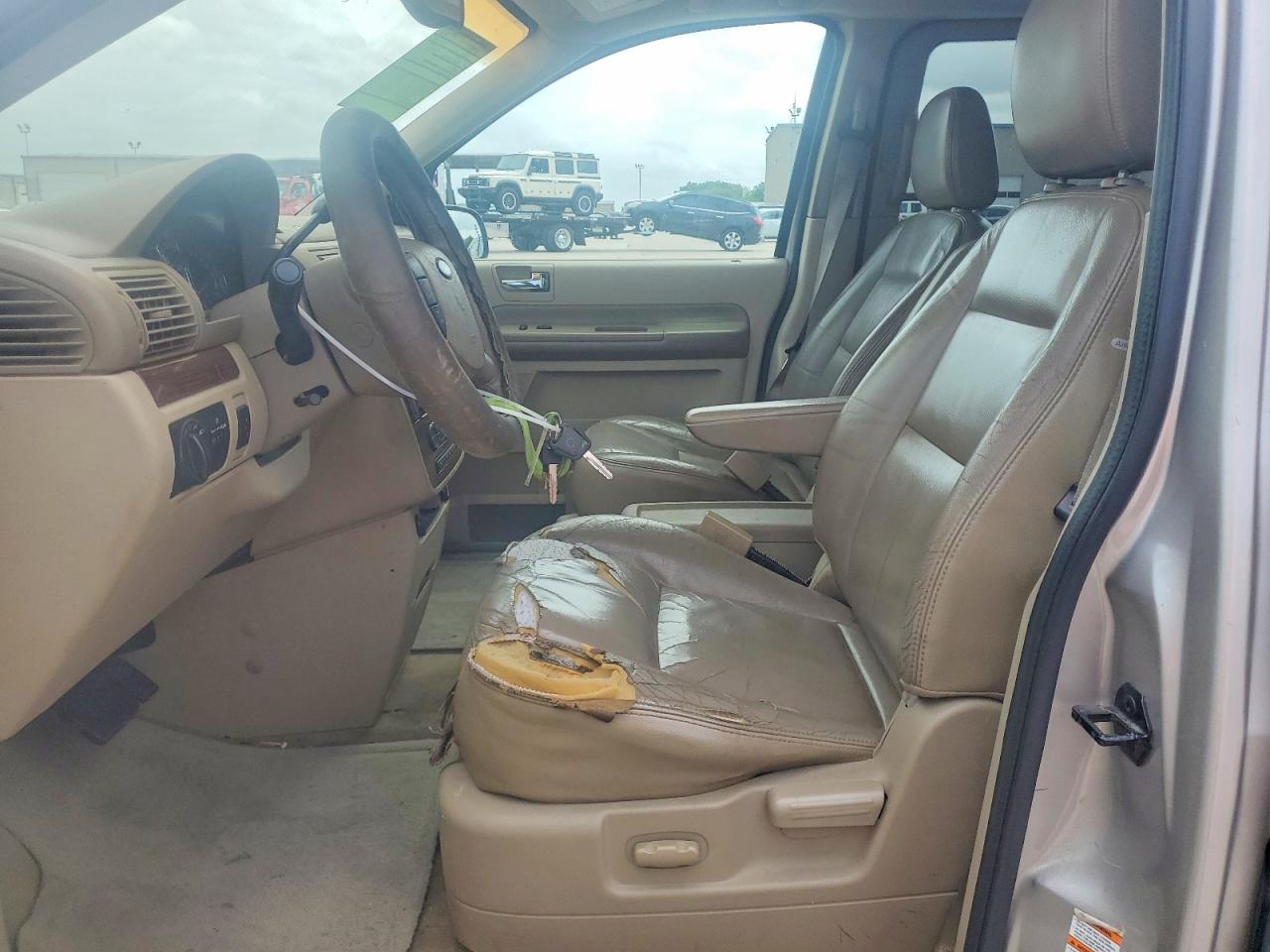 2004 Ford Freestar Limited Tan vin: 2FMDA58214BA61875