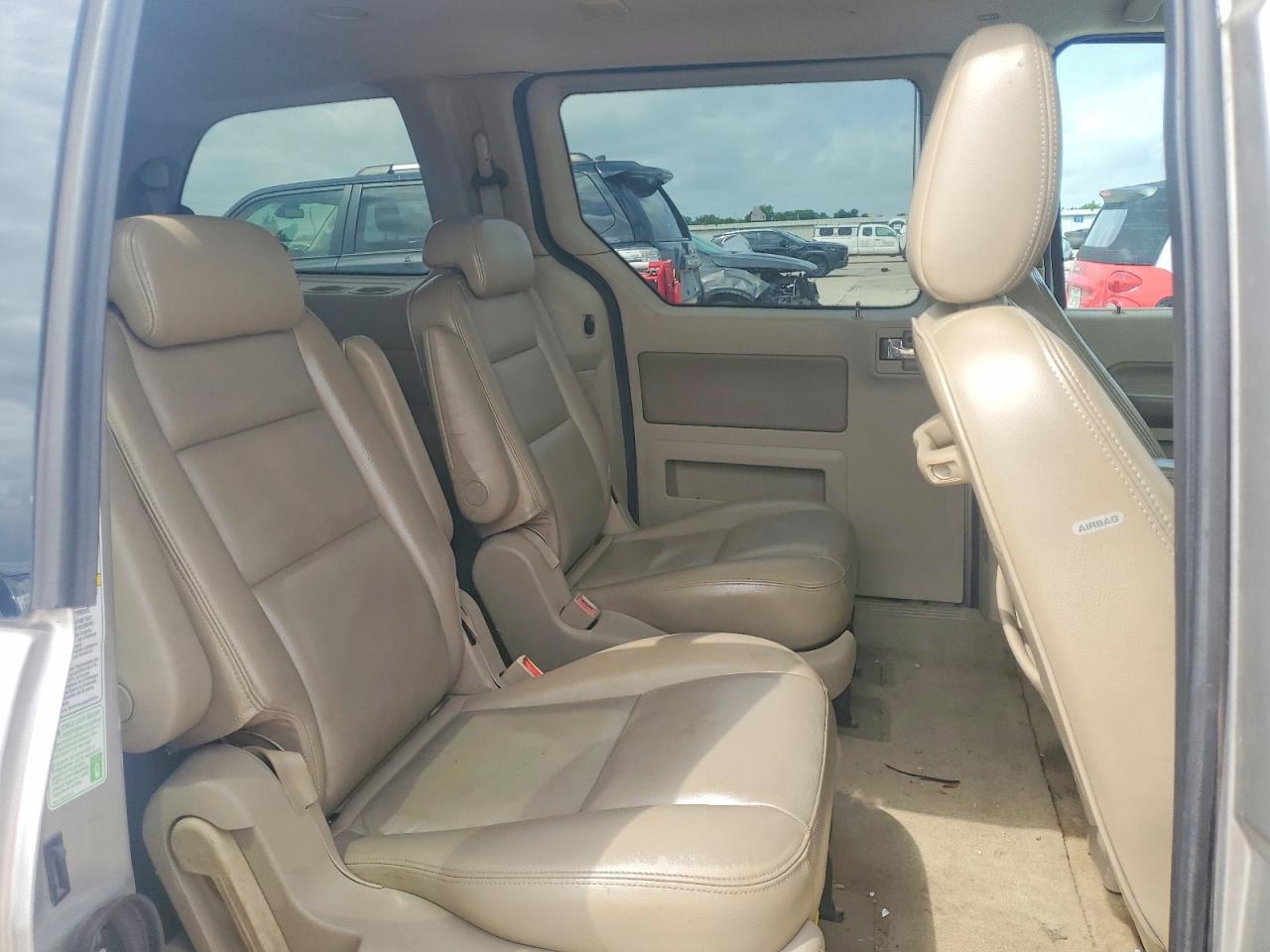 2004 Ford Freestar Limited Tan vin: 2FMDA58214BA61875