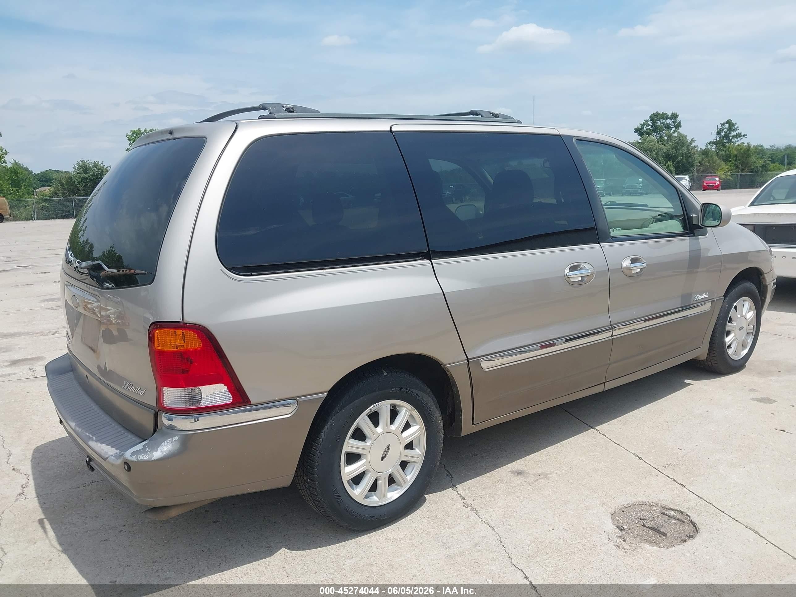 2002 Ford Windstar Limited Золотой vin: 2FMDA58412BA76570