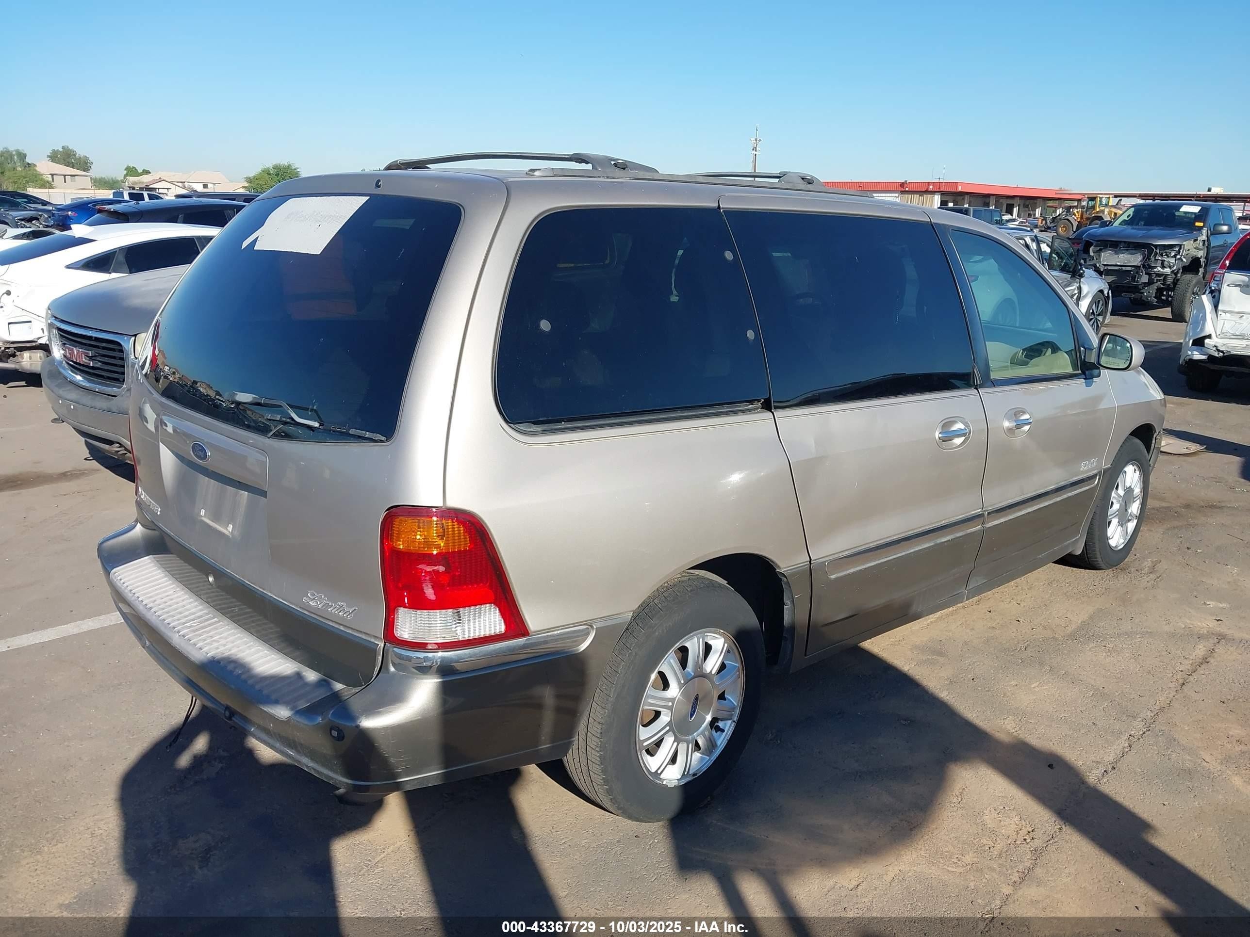 2001 Ford Windstar Limited Gold vin: 2FMDA58451BB04434