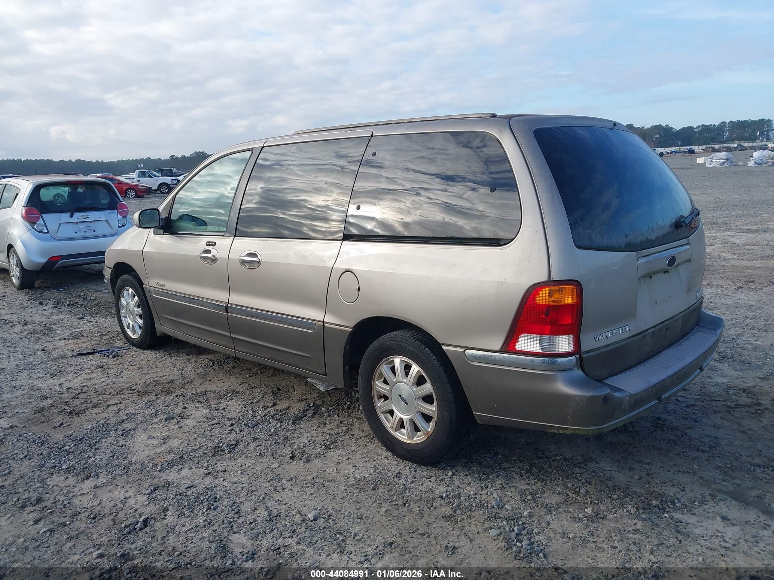 2001 Ford Windstar Limited Tan vin: 2FMDA584X1BB06423