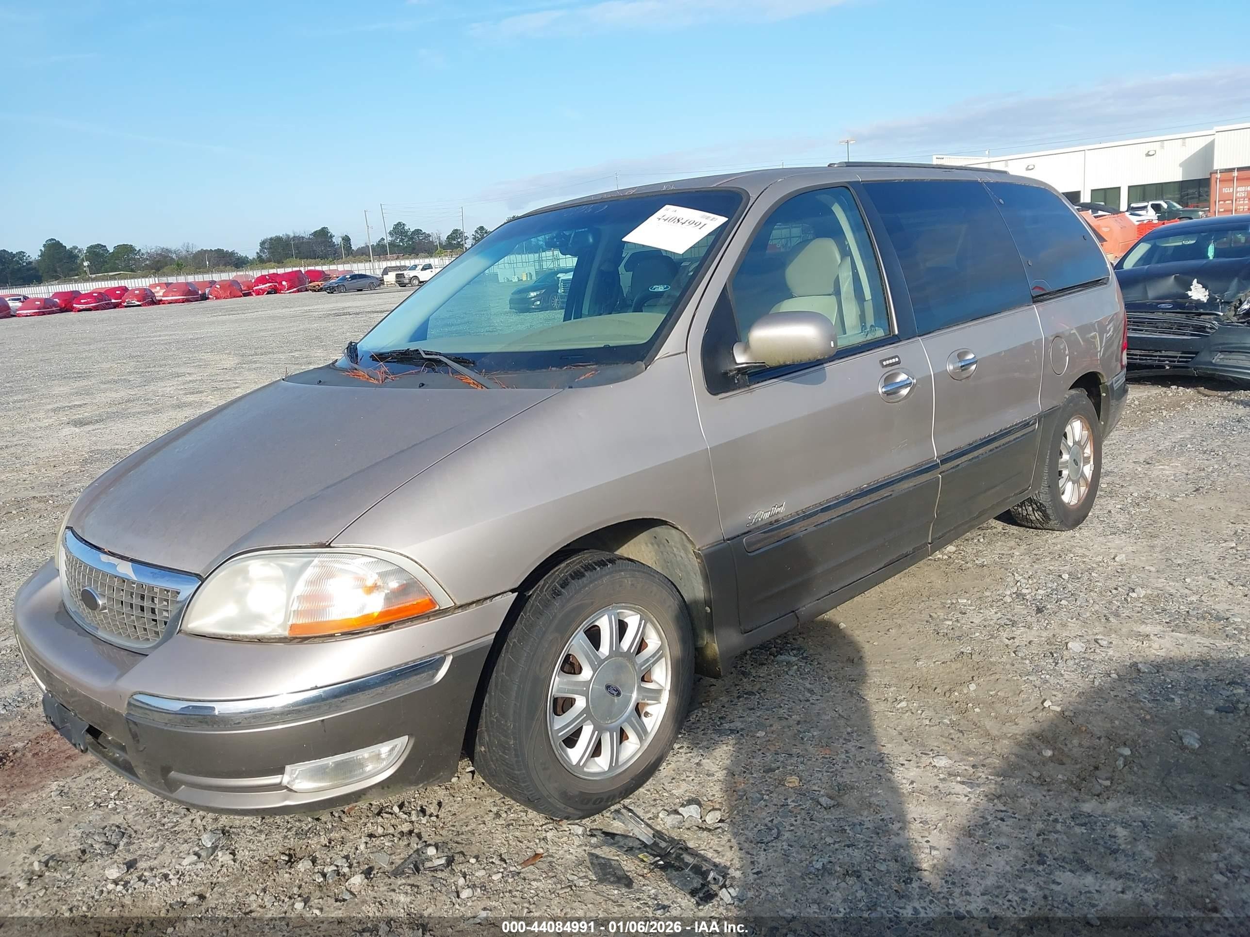 2001 Ford Windstar Limited Tan vin: 2FMDA584X1BB06423