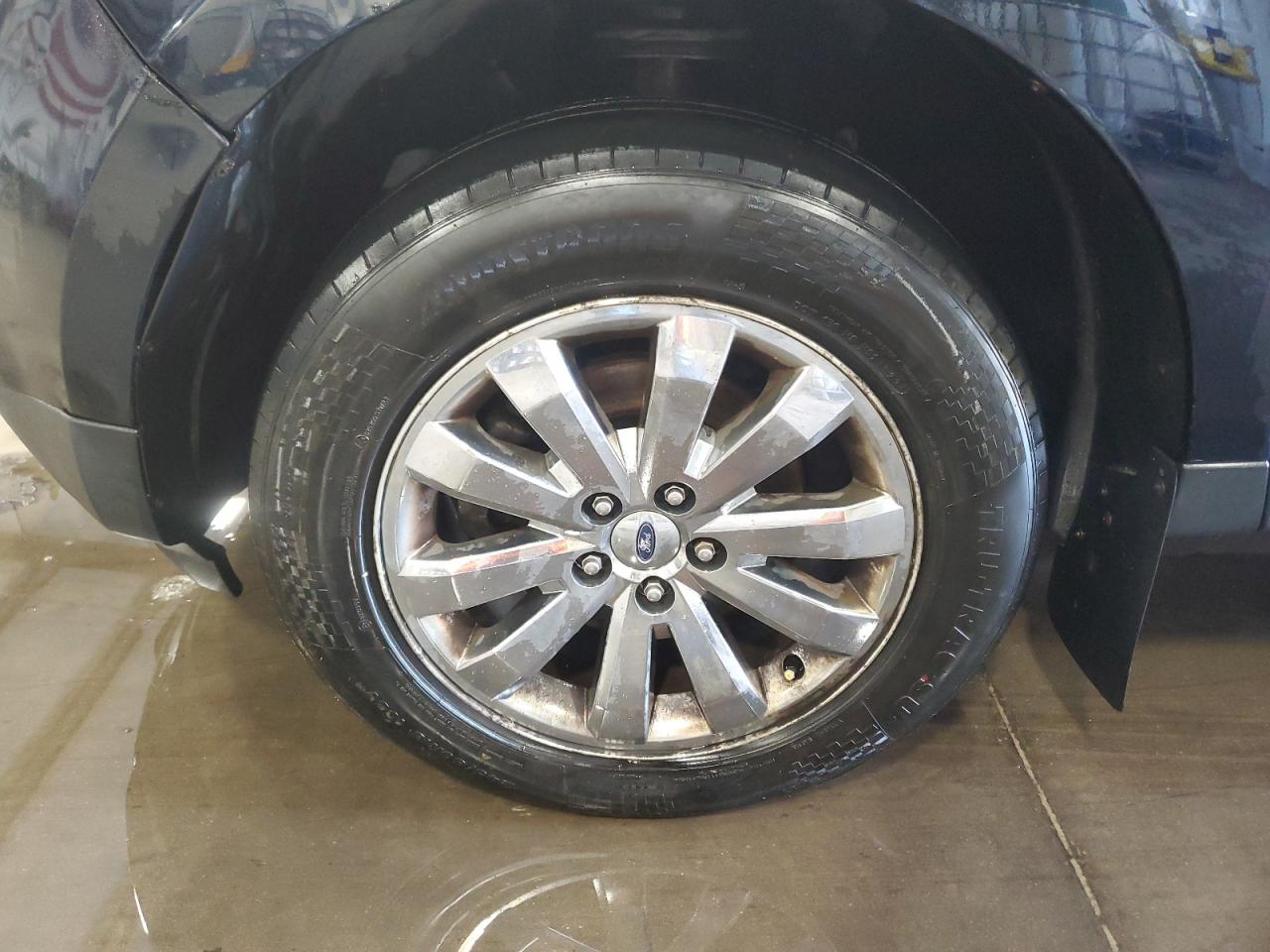 2010 Ford Edge Sel Blue vin: 2FMDK3JC1ABB19077 Damage: Left Front Tire, Worn, Replacement Required