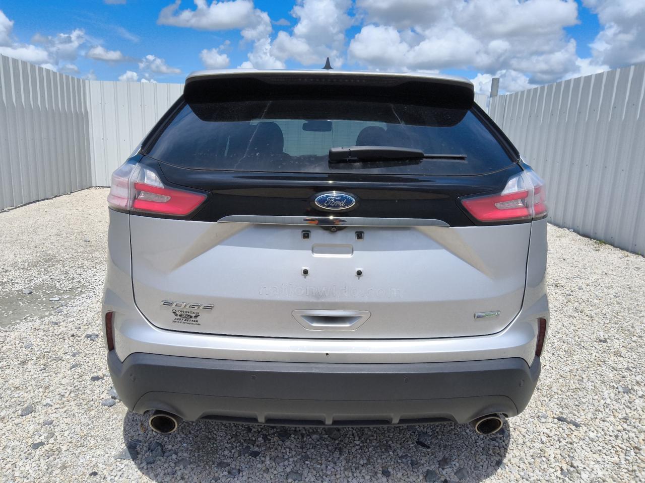 2019 Ford Edge Se Silver vin: 2FMPK3G94KBC64236 Damage: Rear Bumper, Heavy Scratch, 1/8 To 1/2 Inch