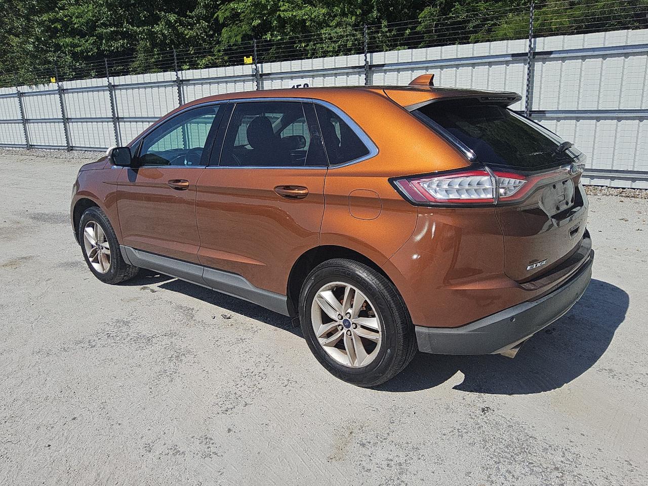2017 Ford Edge Sel Orange vin: 2FMPK3J95HBC27939 Damage: Rear Bumper Cover Upper, Scraped, > 12 Inches