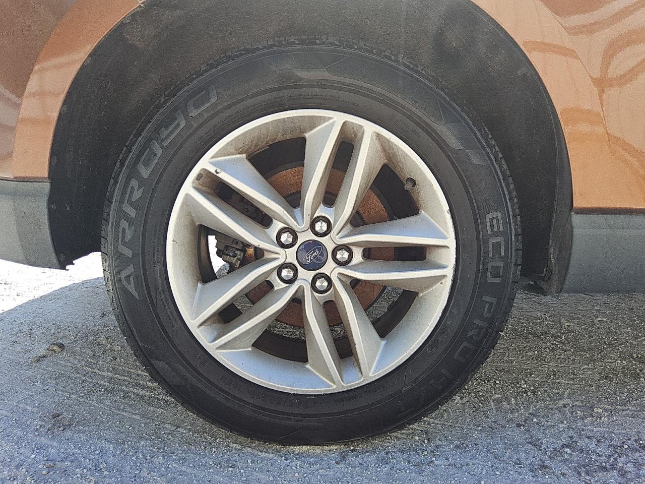 2017 Ford Edge Sel Orange vin: 2FMPK3J95HBC27939 Damage: Right Rear Wheel, Curb Rash, 7 To 8 Inches