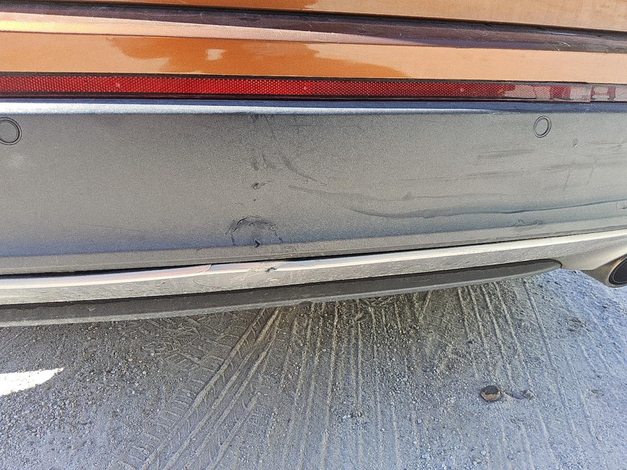 2017 Ford Edge Sel Orange vin: 2FMPK3J95HBC27939 Damage: Rear Bumper Center Molding, Broken, Replacement Required