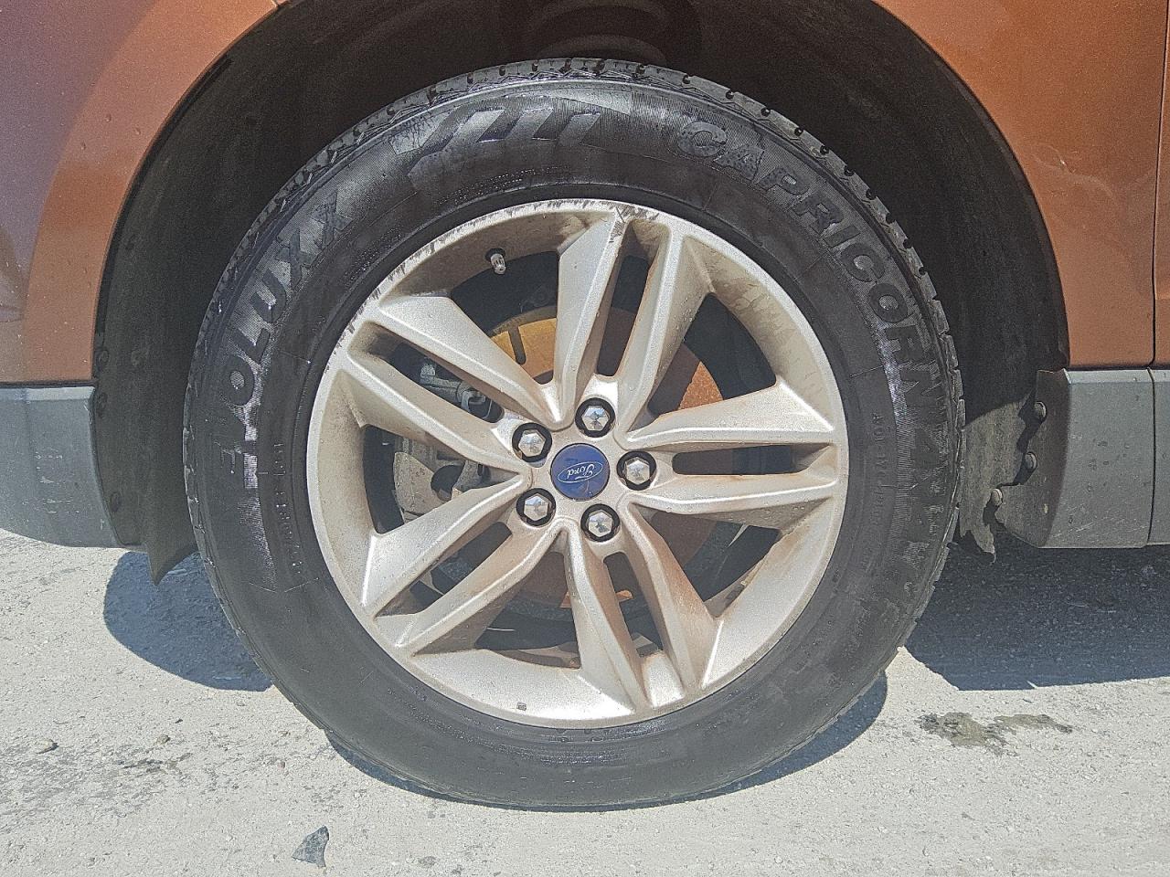 2017 Ford Edge Sel Orange vin: 2FMPK3J95HBC27939 Damage: Left Front Wheel, Curb Rash, 11 To 12 Inches