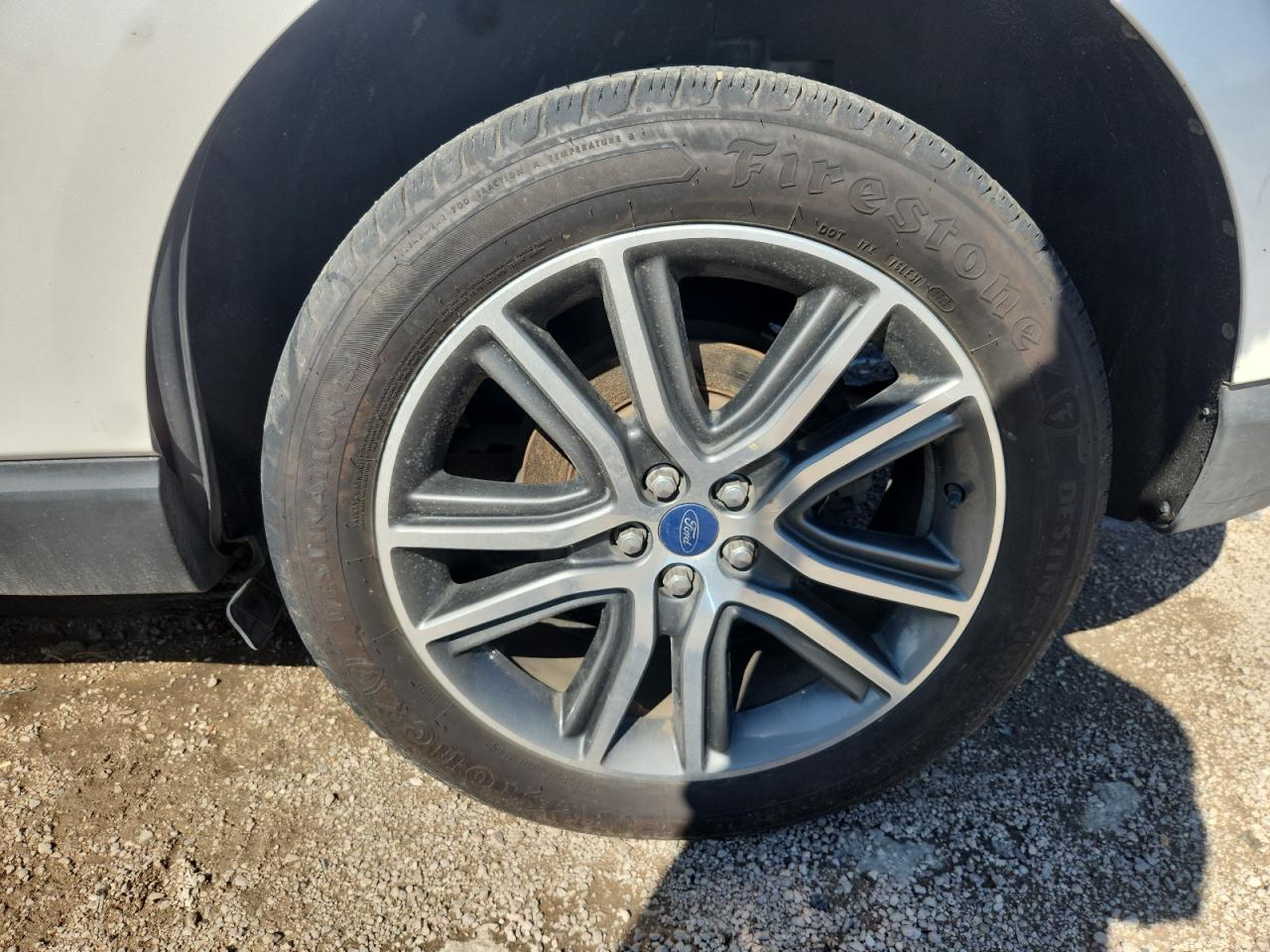 2019 Ford Edge Titanium White vin: 2FMPK3K93KBC68267 Damage: Left Rear Tire, Worn, Replacement Required