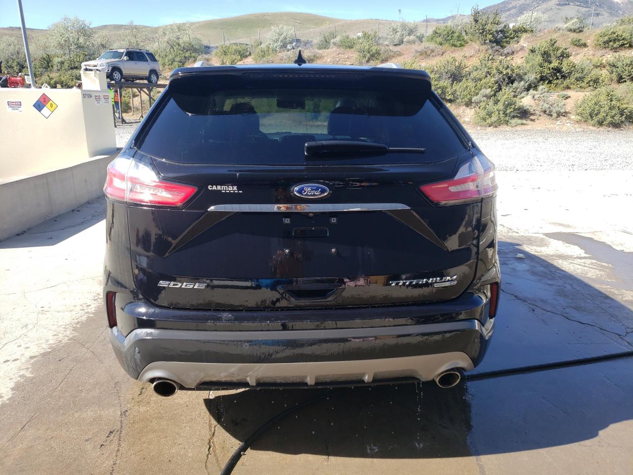 2019 Ford Edge Titanium Black vin: 2FMPK4K92KBC02122 Damage: Lift Gate, Dent(S) W/ Paint Dmg, 1/2 To 1 Inch