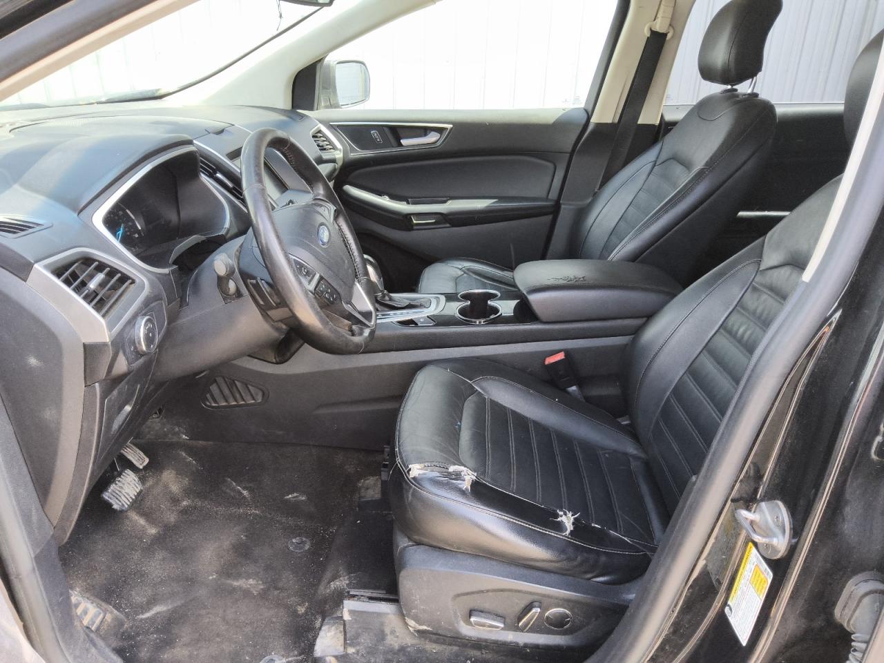 2015 Ford Edge Sel Black vin: 2FMTK4J9XFBB45285 Damage: Left Front Seat, Torn, 1 To 2 Inches
