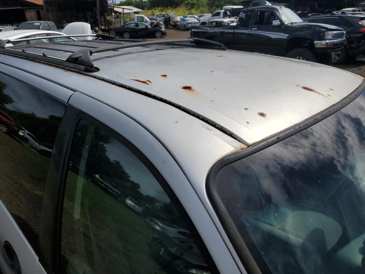 2000 Ford Windstar Lx Silver vin: 2FMZA5143YBA55566 Damage: Roof Panel, Rust, 2 To 3 Inches
