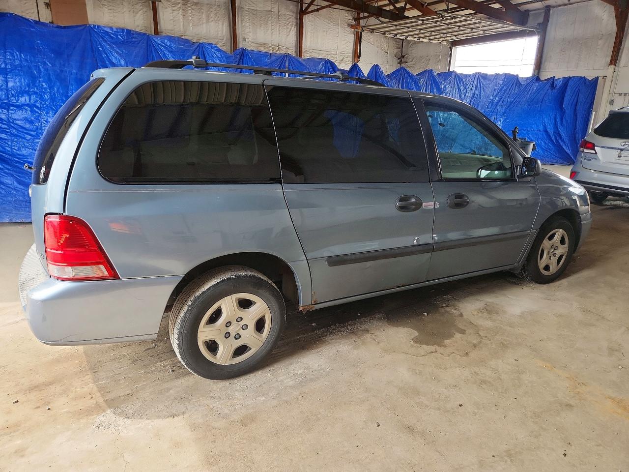 2004 Ford Freestar Lane Blue vin: 2FMZA51644BA79693