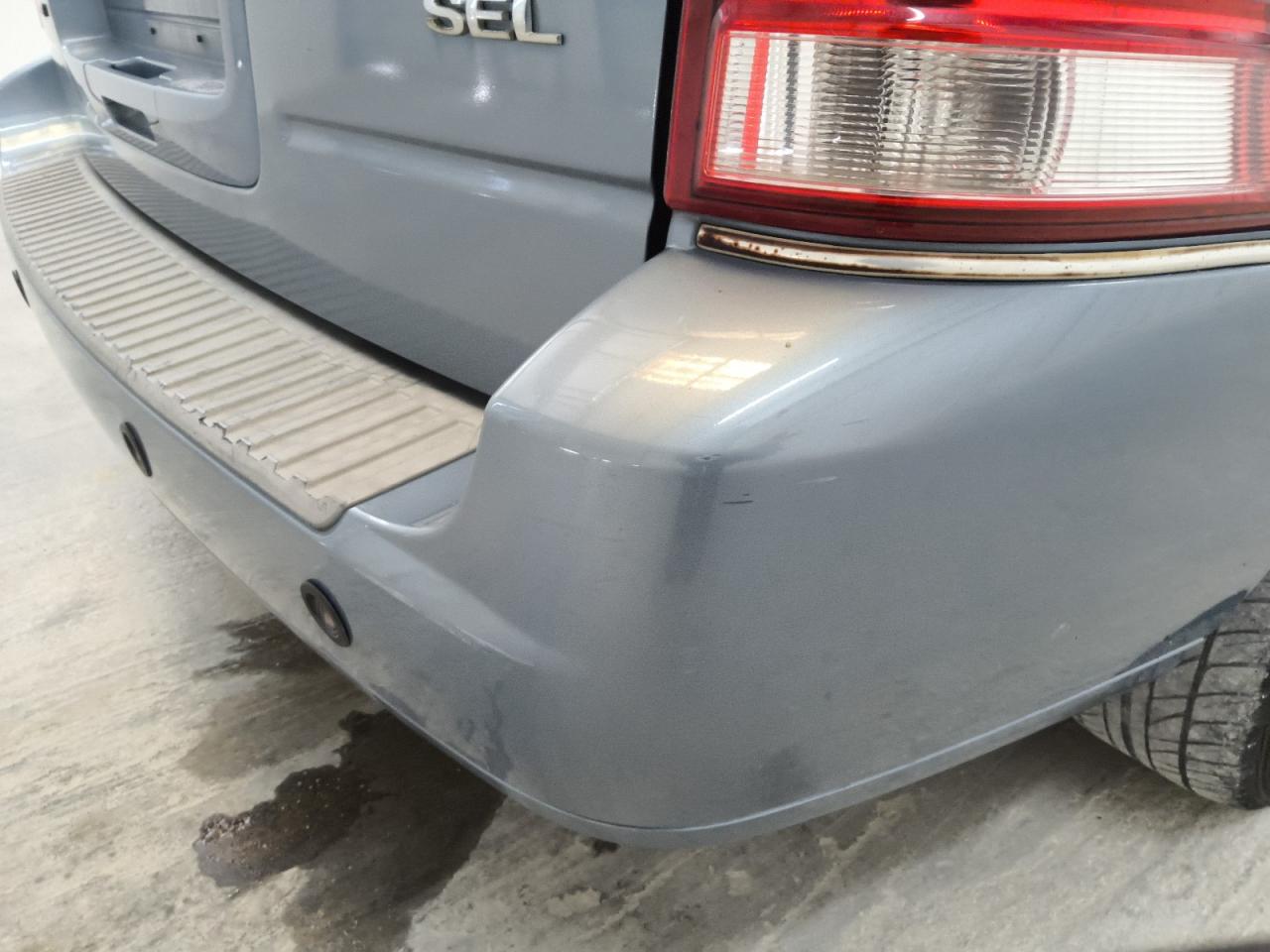 2007 Ford Freestar Sel Blue vin: 2FMZA52267BA04753 Damage: Rear Bumper, Heavy Scratch, 1/2 To 1 Inch