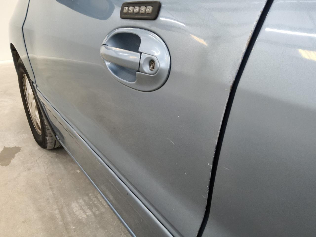 2007 Ford Freestar Sel Blue vin: 2FMZA52267BA04753 Damage: Left Front Door, Dent(S) W/ Paint Dmg, 1/2 To 1 Inch