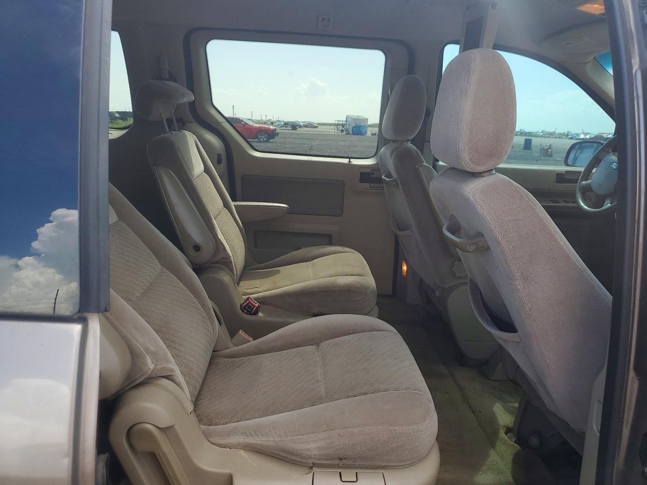 2005 Ford Freestar Sel Gold vin: 2FMZA522X5BA90081