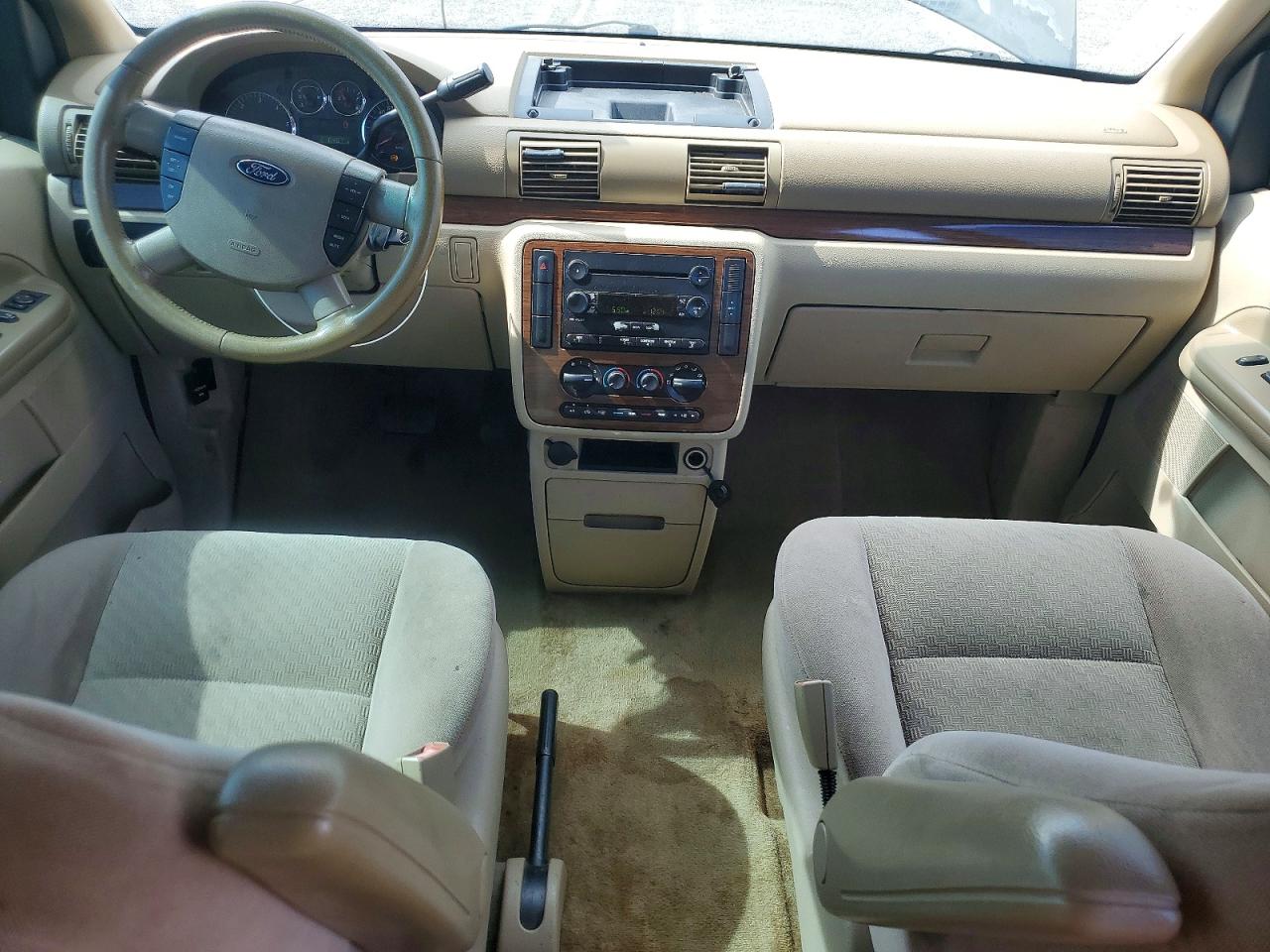 2005 Ford Freestar Sel Gold vin: 2FMZA522X5BA90081