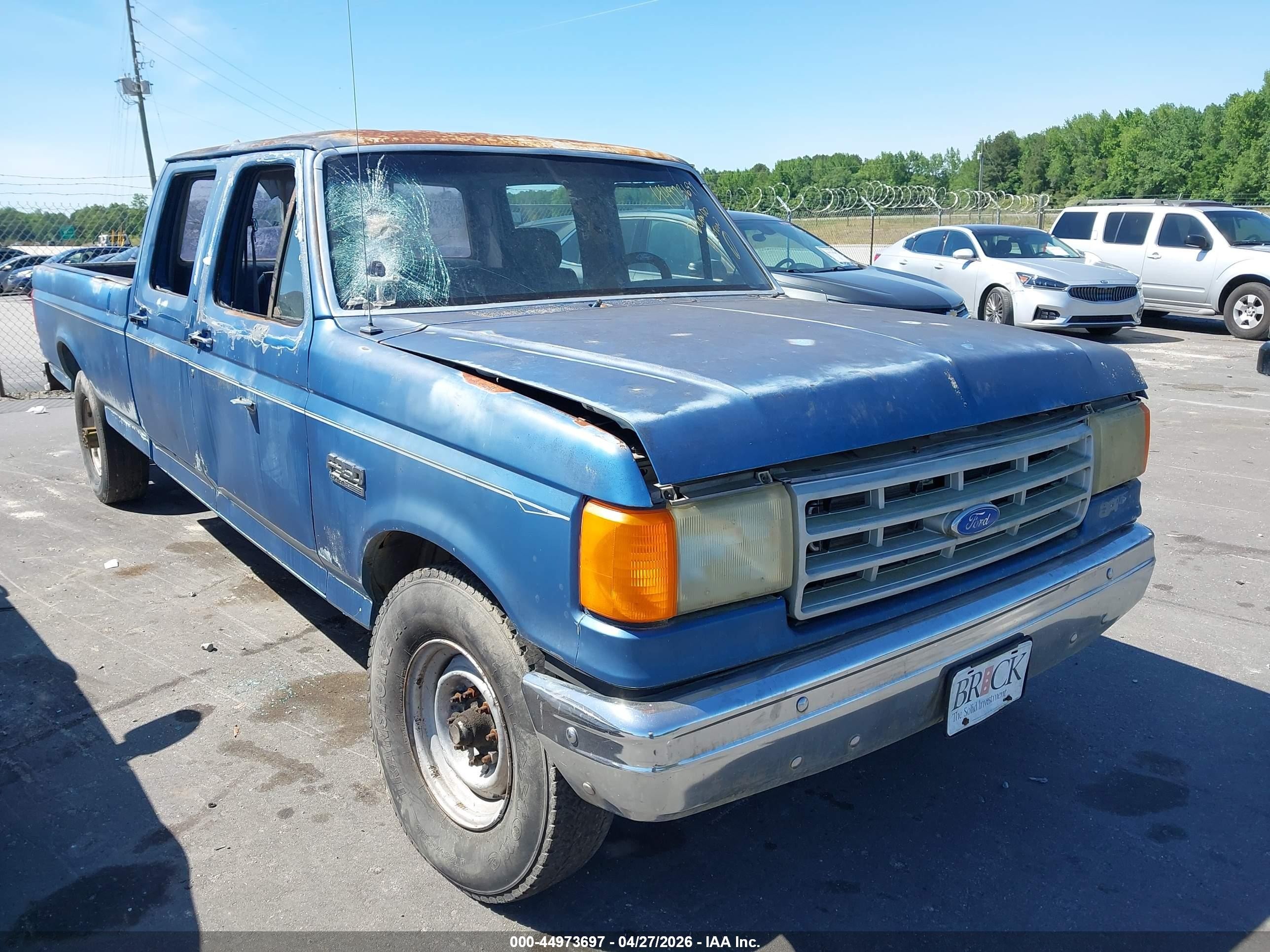 1989 Ford F350   Blue vin: 2FTJW35G3KCA08230
