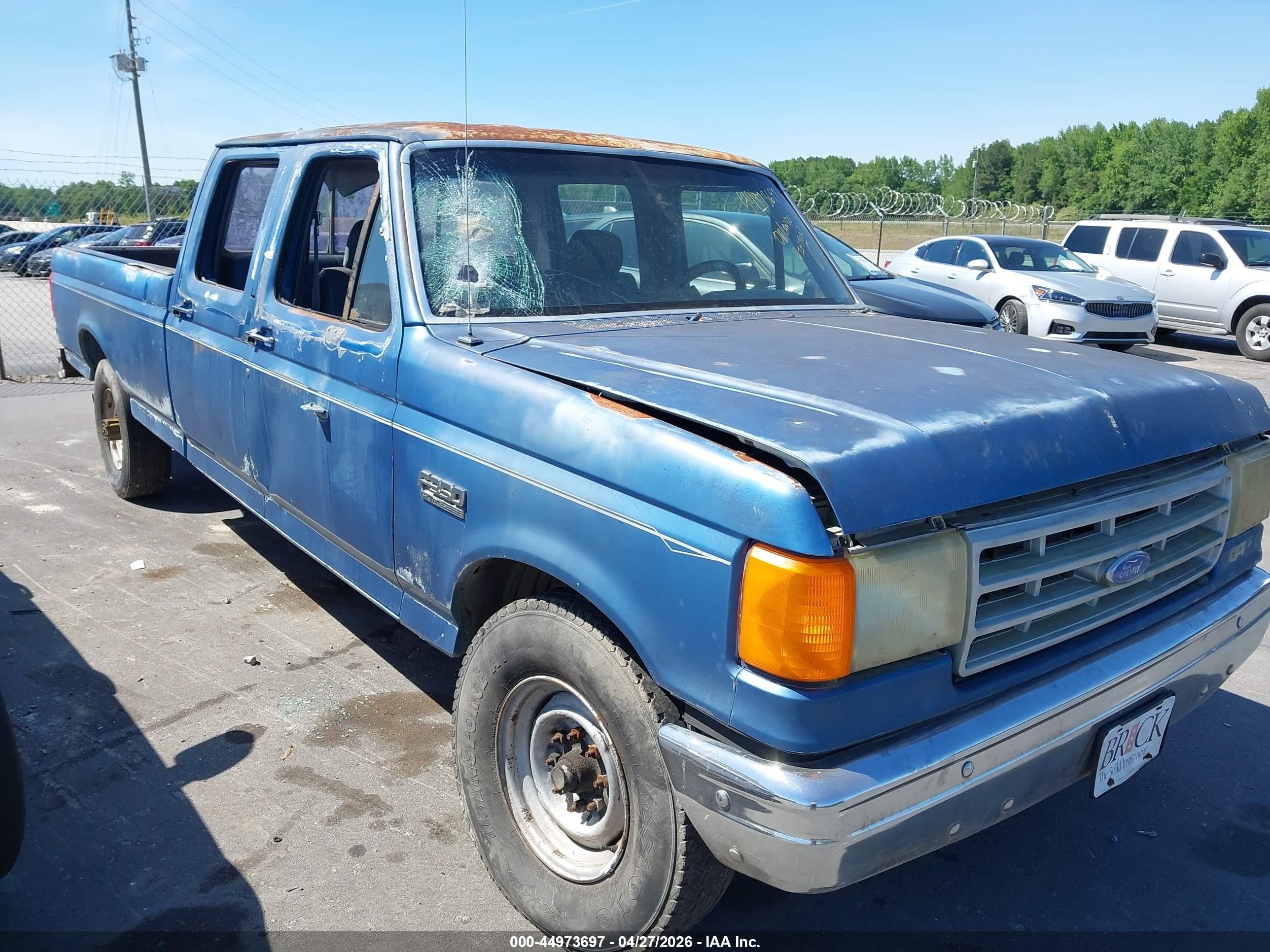 1989 Ford F350   Blue vin: 2FTJW35G3KCA08230