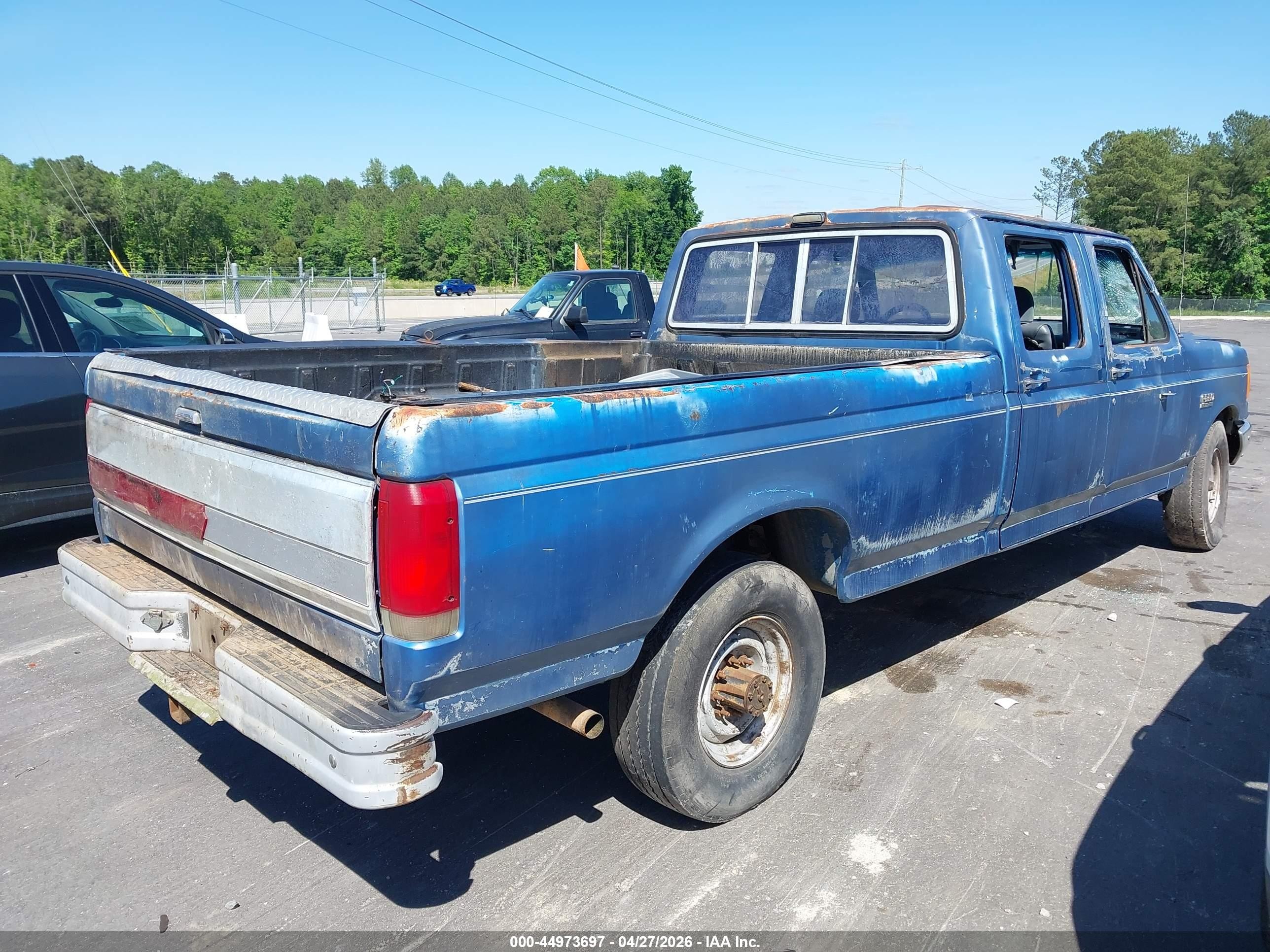 1989 Ford F350   Blue vin: 2FTJW35G3KCA08230