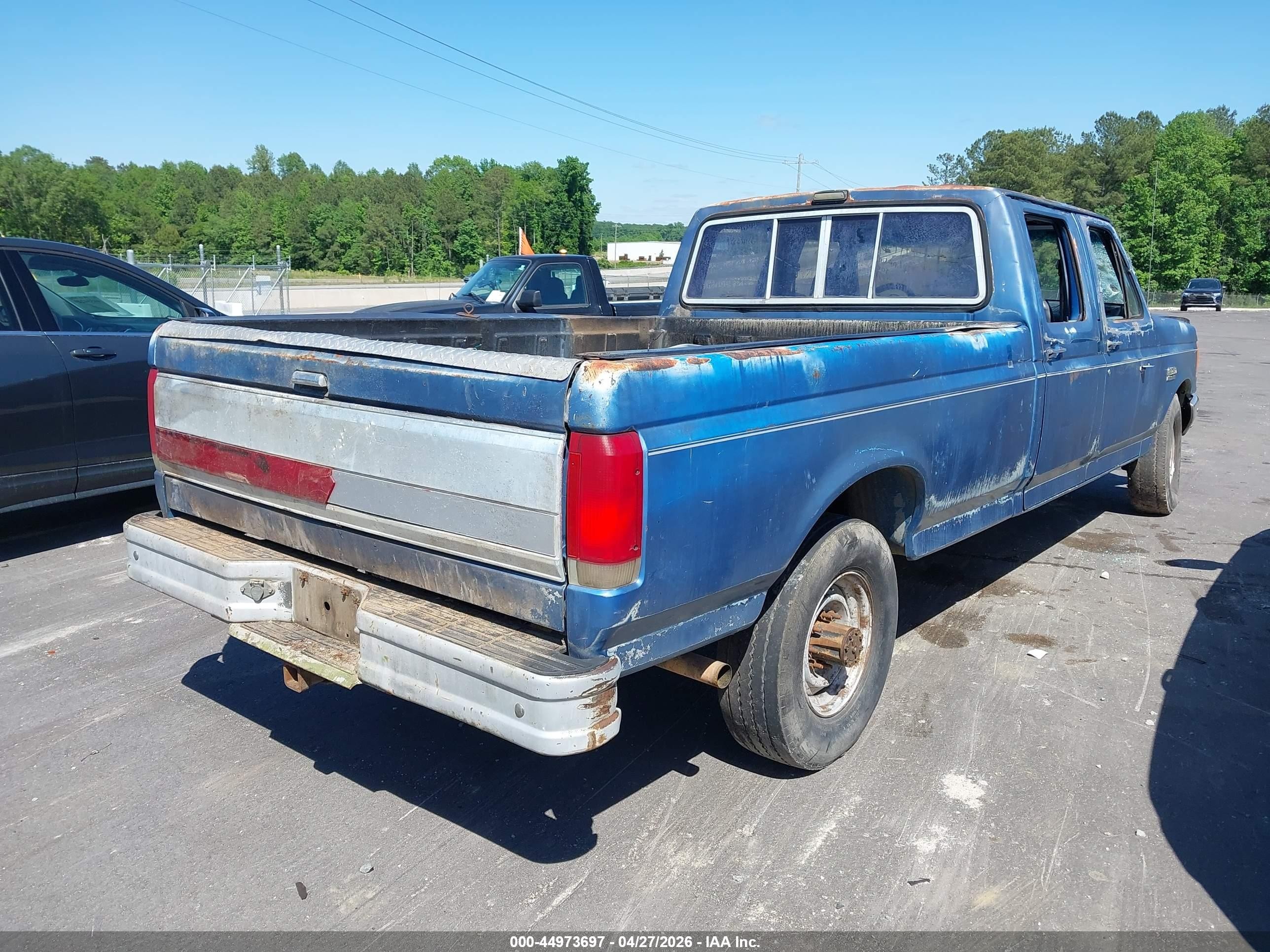 1989 Ford F350   Blue vin: 2FTJW35G3KCA08230