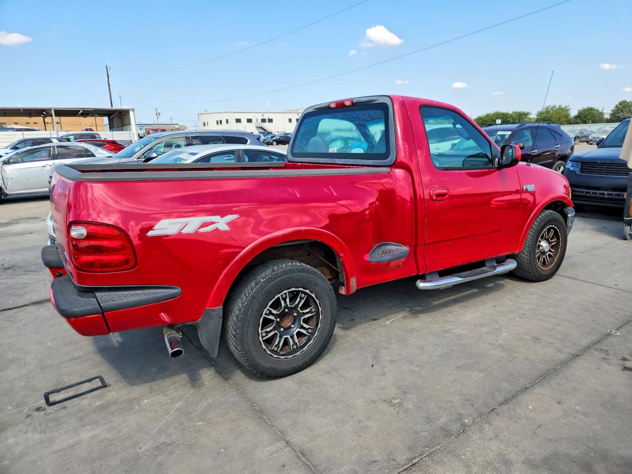 2003 Ford F150 Red vin: 2FTRF07263CA54493