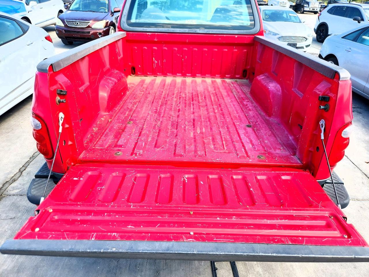 2003 Ford F150 Red vin: 2FTRF07263CA54493