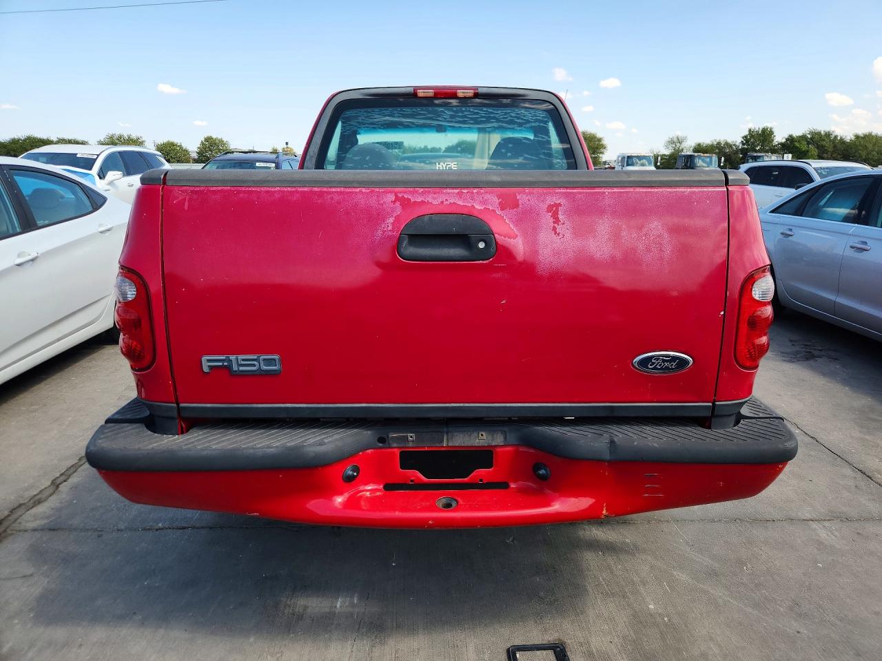 2003 Ford F150 Red vin: 2FTRF07263CA54493