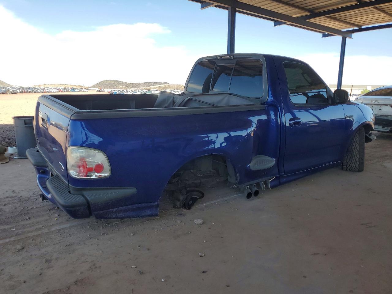 2004 Ford F150 Svt Lightning Blue vin: 2FTRF07334CA49262