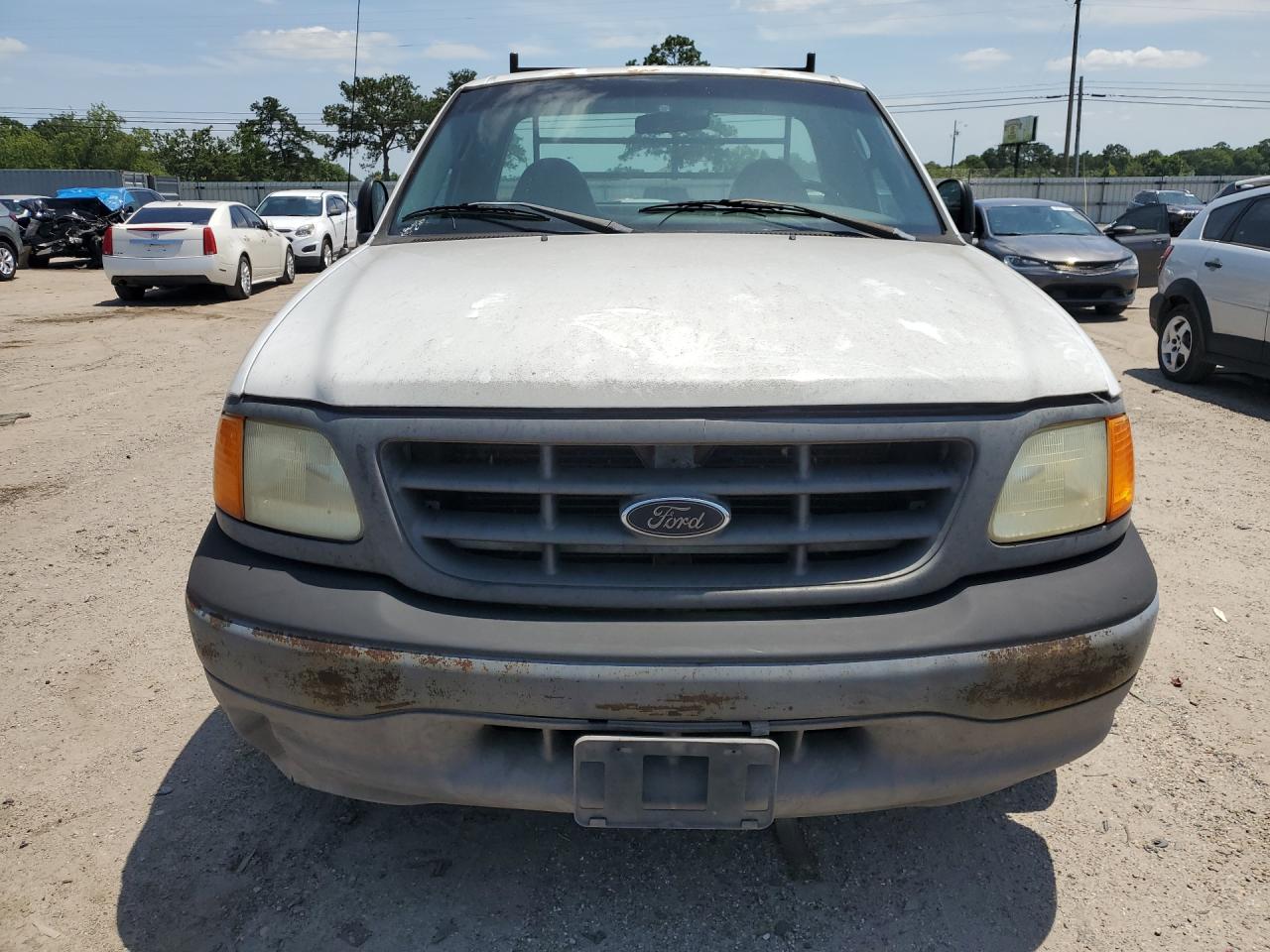 2004 Ford F-150 Heritage Classic White vin: 2FTRF17294CA51370 Damage: Grille, Peeling, > 12 Inches